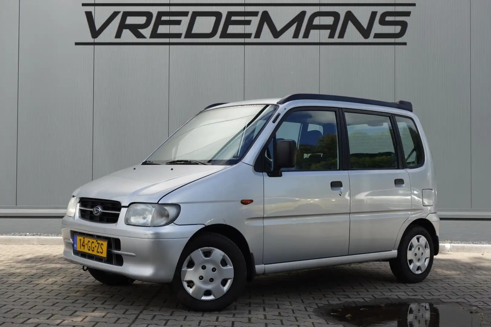 Daihatsu Move 1.0-12V Gris - 1
