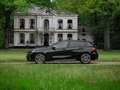 BMW 135 1-serie M135i xDrive High Executive | Pano-dak | H Zwart - thumbnail 1