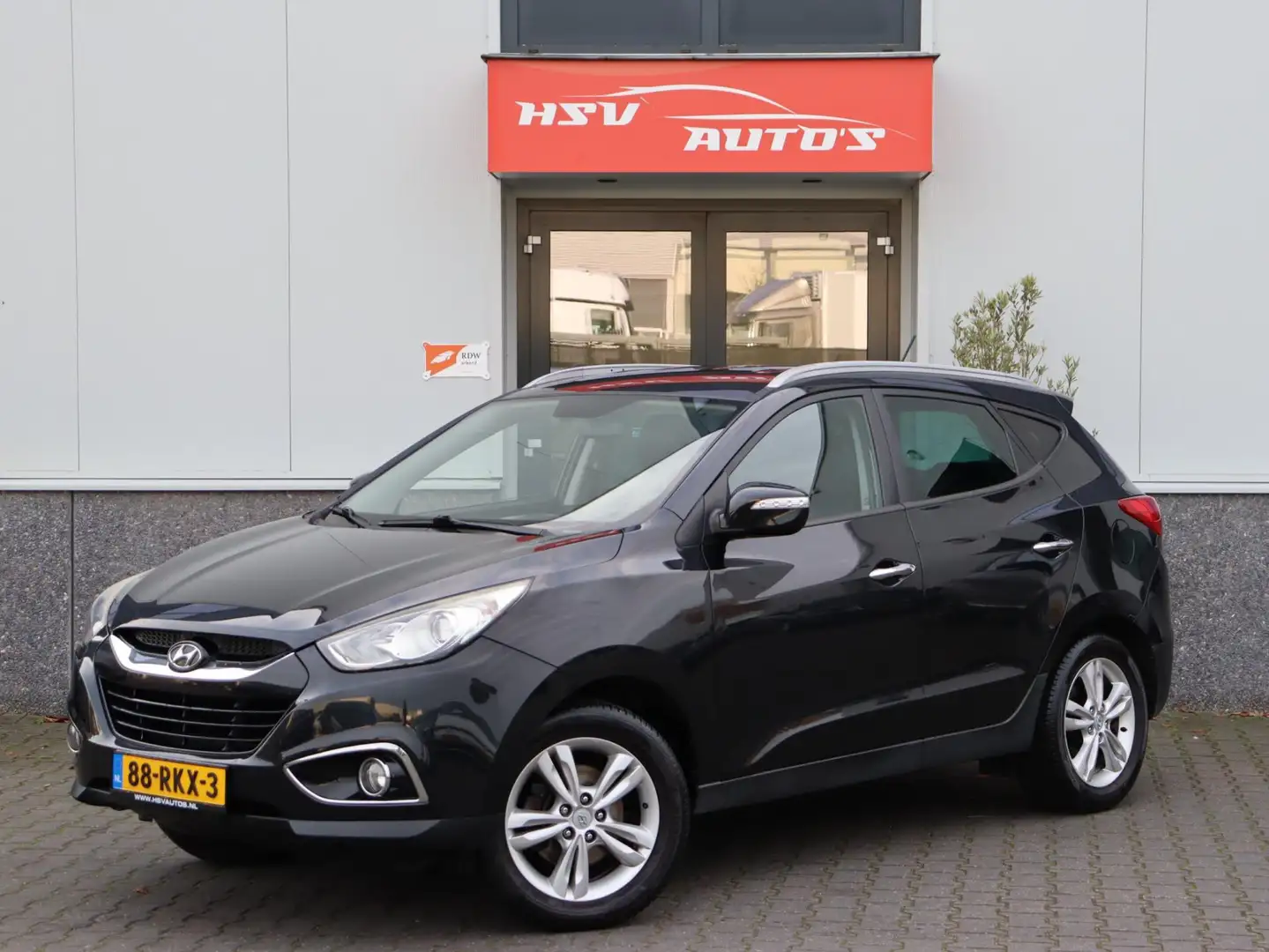 Hyundai iX35 2.0i Style airco H-Leer trekhaak Zwart - 1