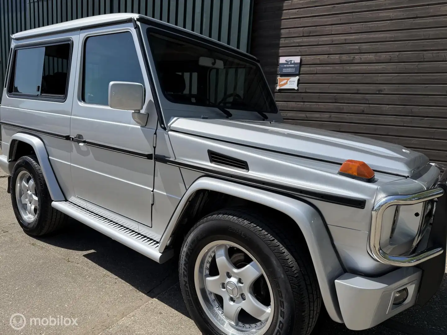 Mercedes-Benz G 230 GE 5-Bak Navi/sch.dak/el.stoel Grijs - 2