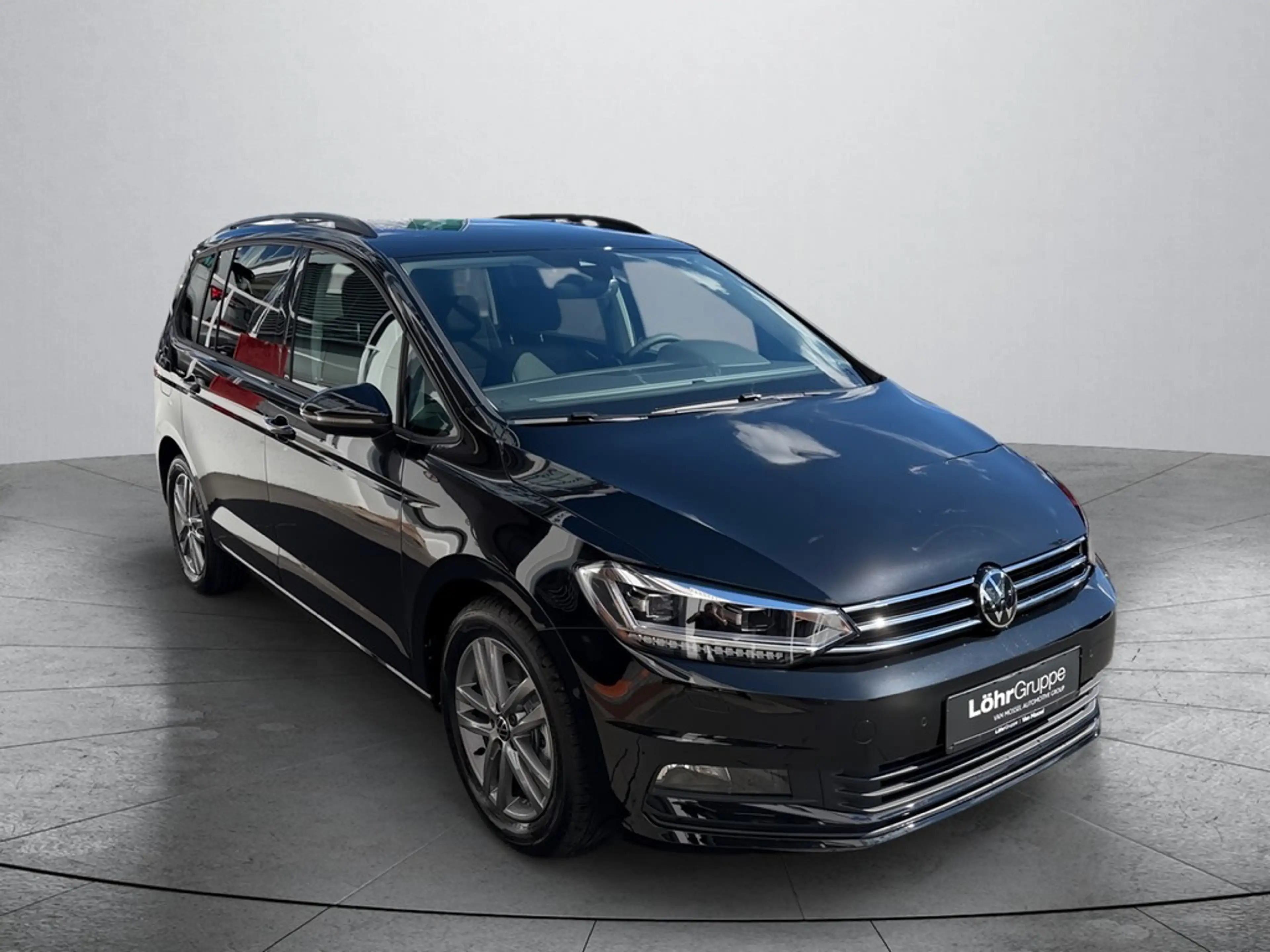 Volkswagen Touran 1,5 l TSI DSG — photo 6