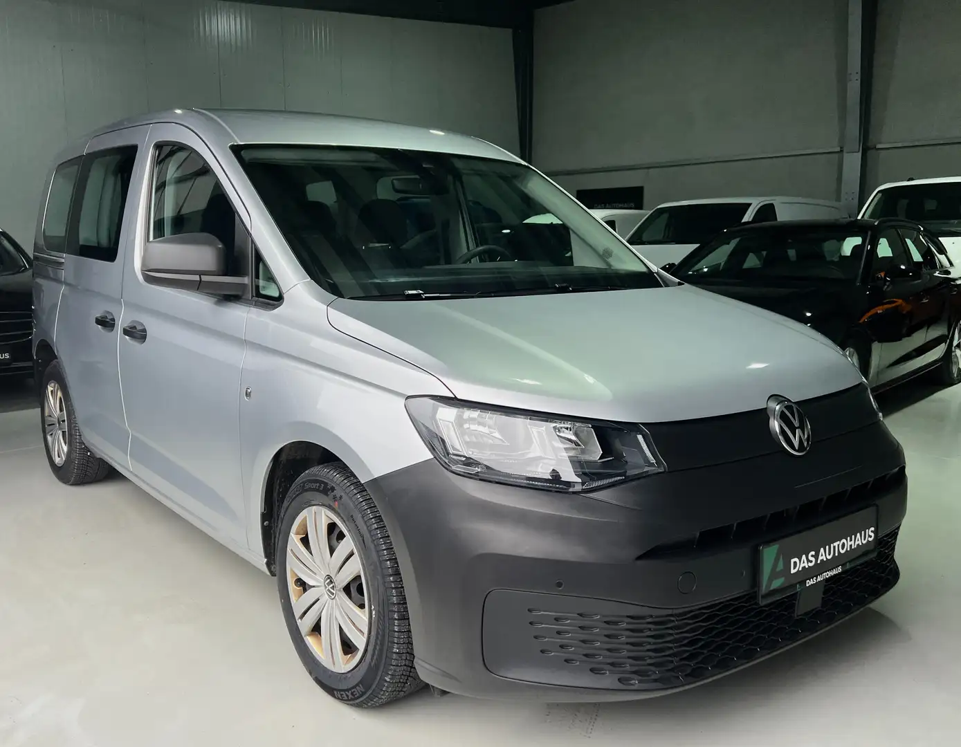 Volkswagen Caddy Kombi 2,0 TDI 5 Sitzer/Navi/Parksensoren/DAB+ Silber - 1