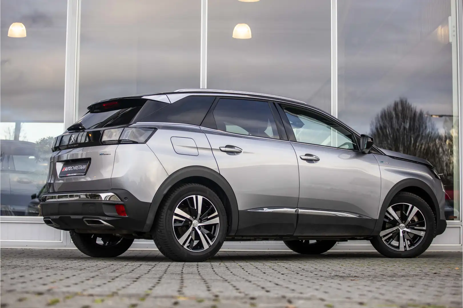 Peugeot 3008 1.6 HYbrid4 300 GT | Pano | Camera | ACC Gris - 2