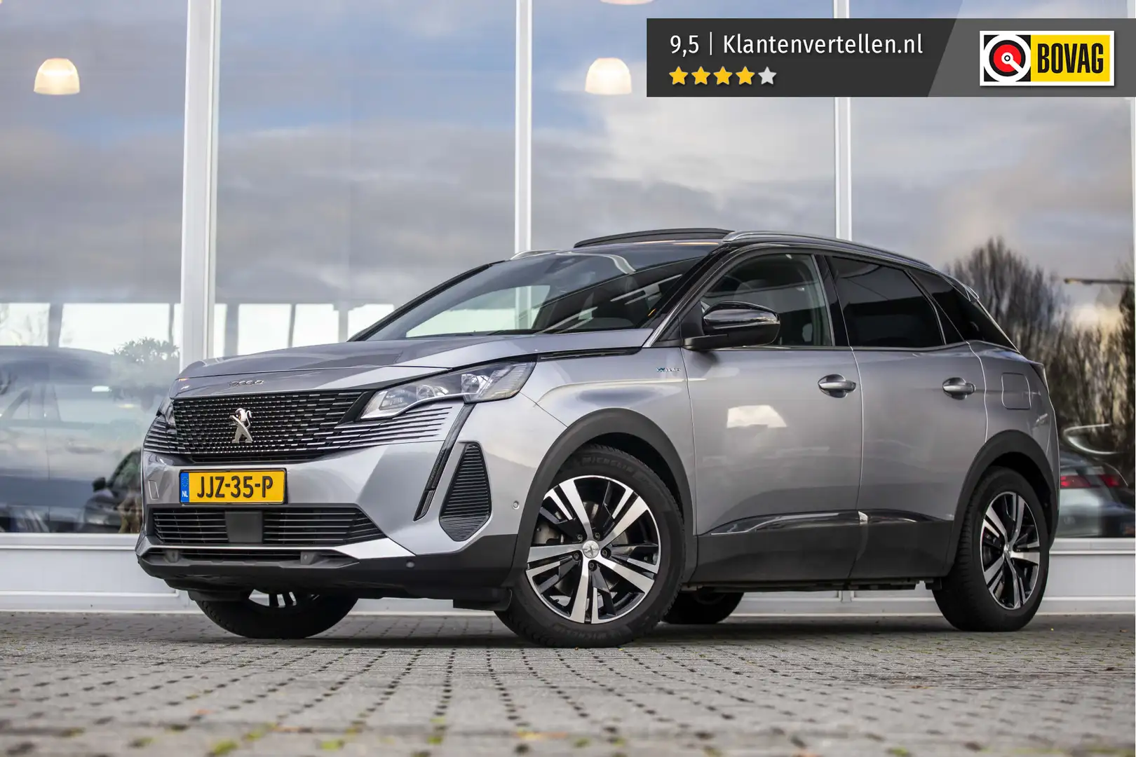 Peugeot 3008 1.6 HYbrid4 300 GT | Pano | Camera | ACC Gris - 1