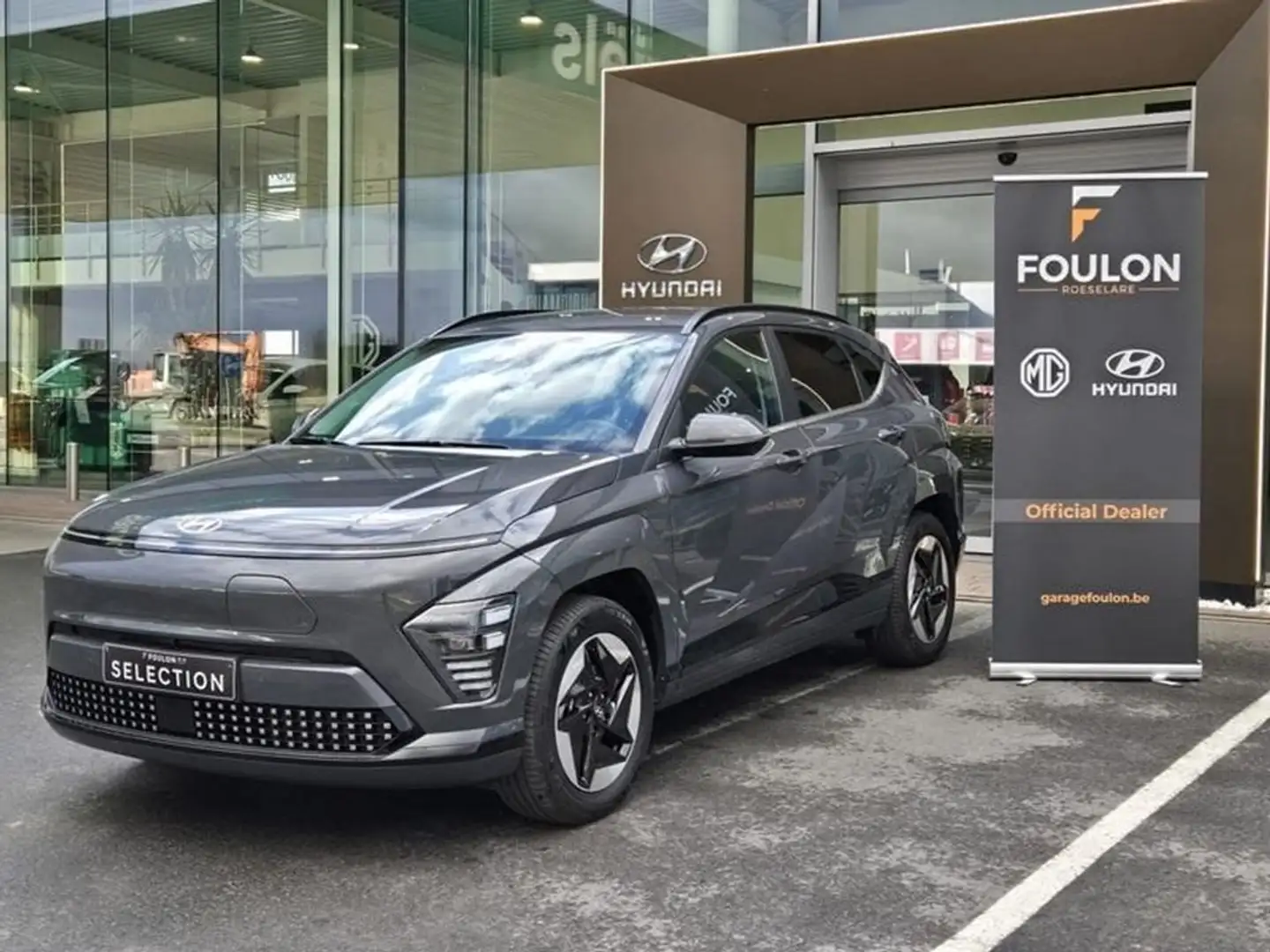 Hyundai KONA 64 kWh Sky +HUD Full option Grijs - 1