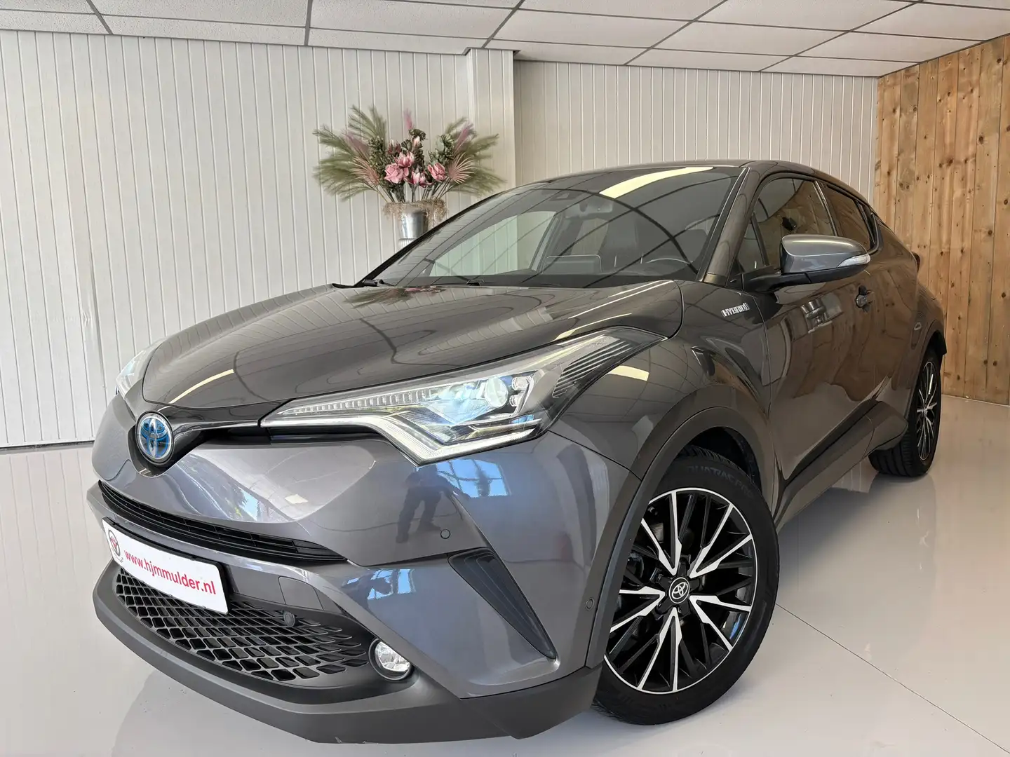 Toyota C-HR 1.8 Hybrid Executive, nap, leder, navi, cruise con Gris - 1