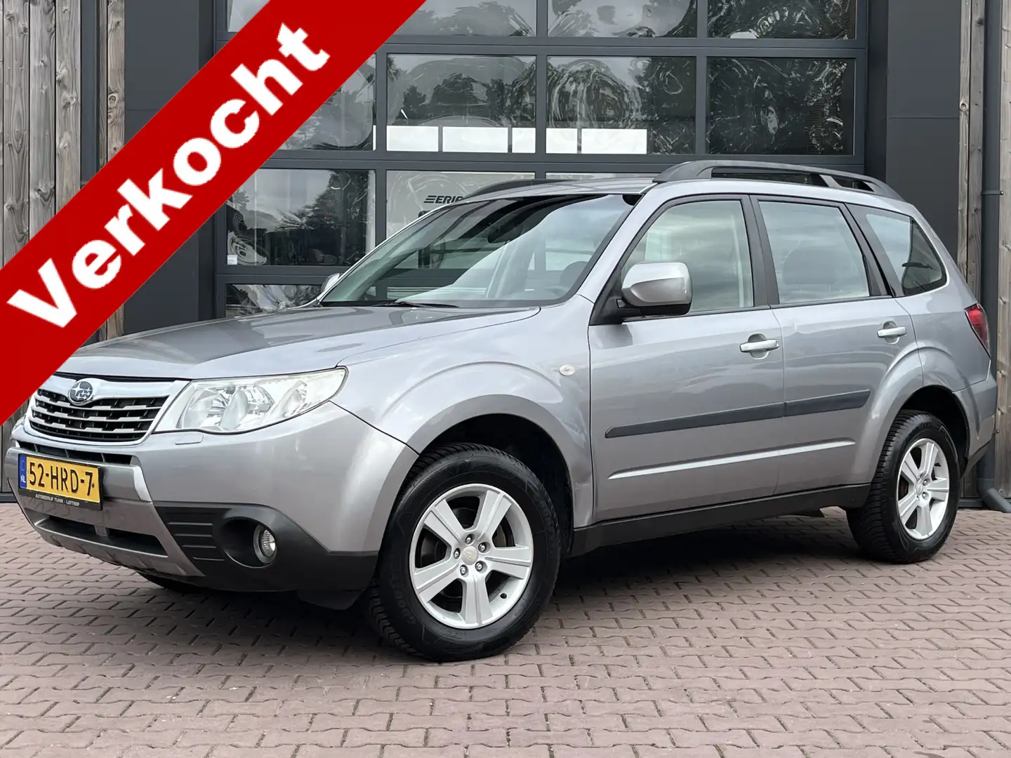 Subaru Forester 2.0 Luxury AWD | Airco | Trekhaak | PDC | Stoelver Gris - 1