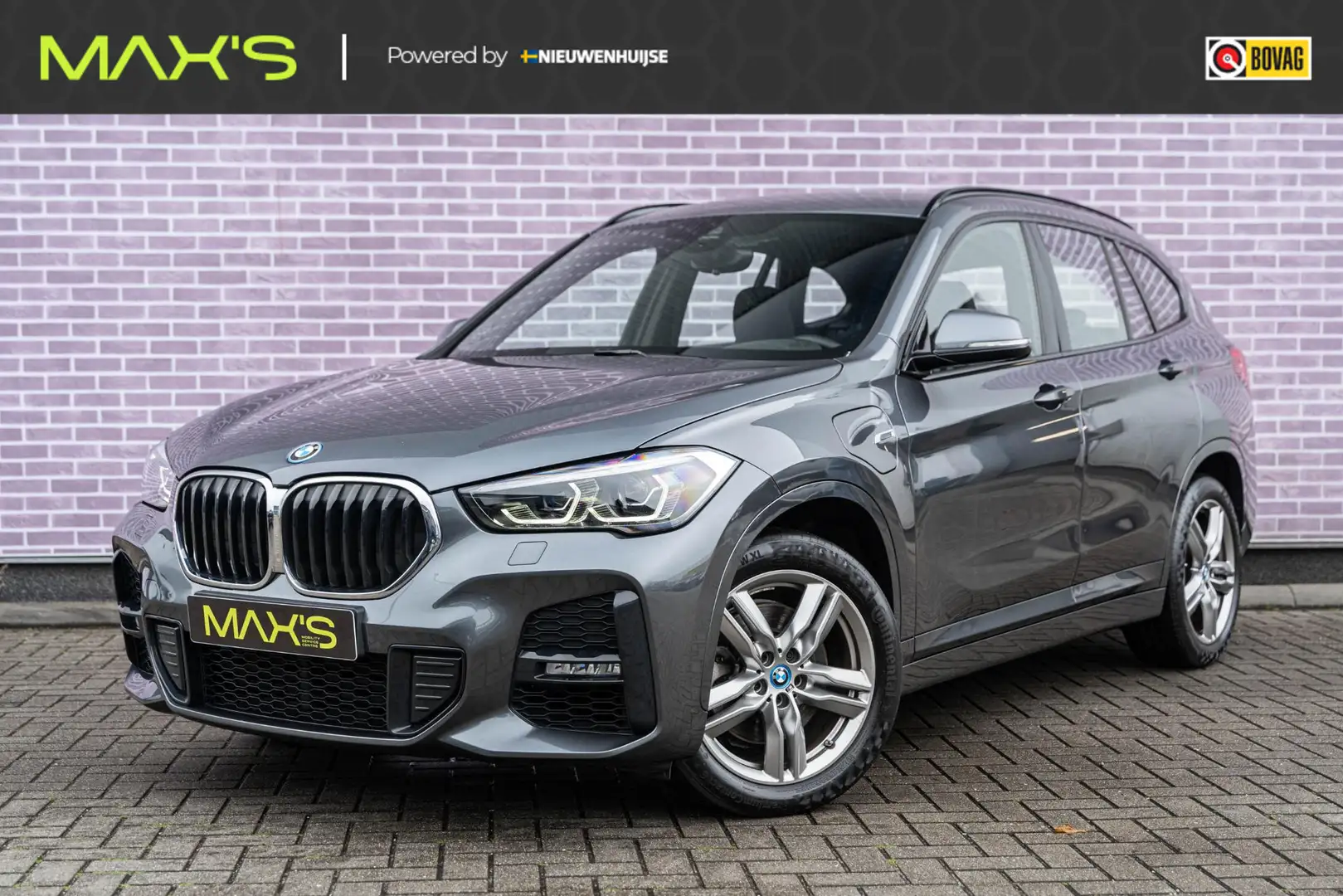 BMW X1 xDrive25e High Executive | M Sport | Trekhaak | Na Grijs - 1