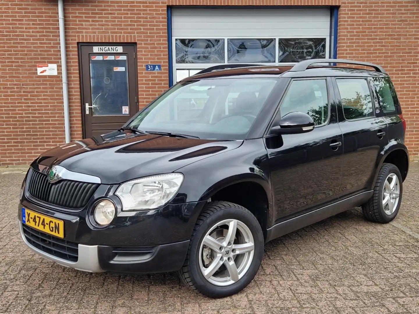 Skoda Yeti 1.2 TSI Active Plus Airco Trekhaak Cruise Negro - 1