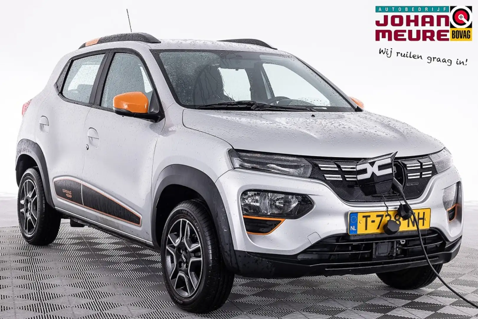 Dacia Spring Expression 27 kWh | 94% SOH | NAVI | LEDER ✅ 1e Ei Grijs - 1