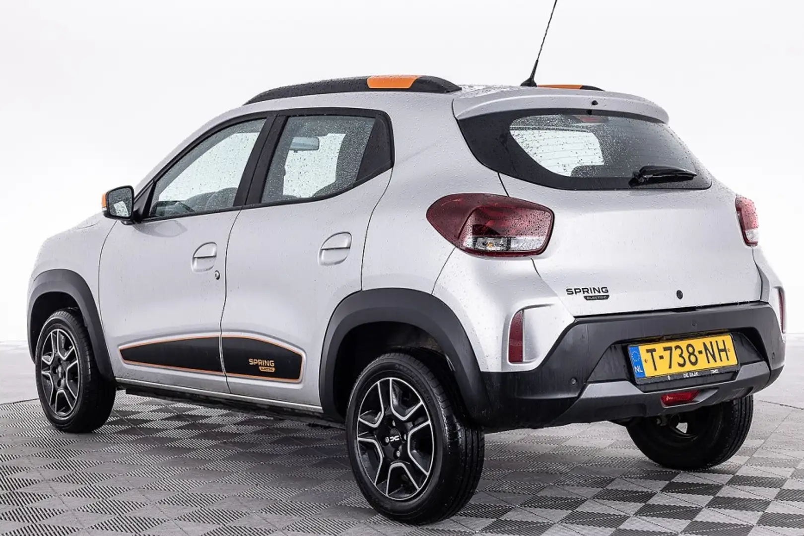 Dacia Spring Expression 27 kWh | 94% SOH | NAVI | LEDER ✅ 1e Ei Grijs - 2