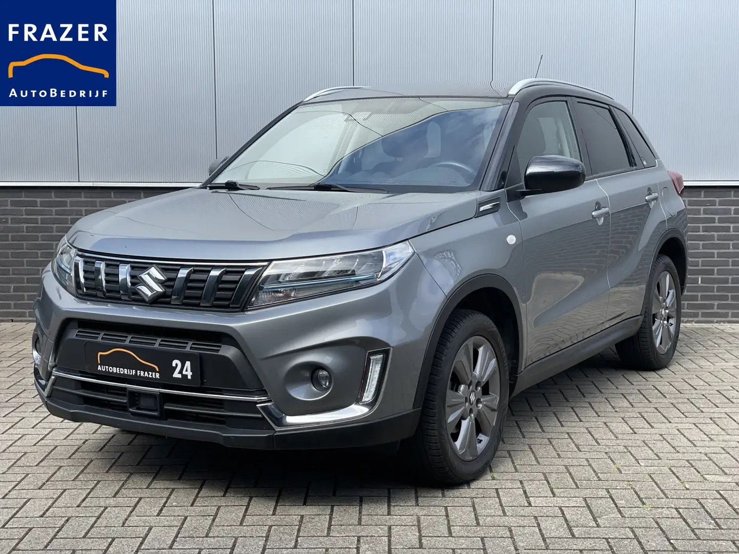 Suzuki Vitara 1.4 Boosterjet Style Smart Hybrid RIJKLAAR Grijs - 1