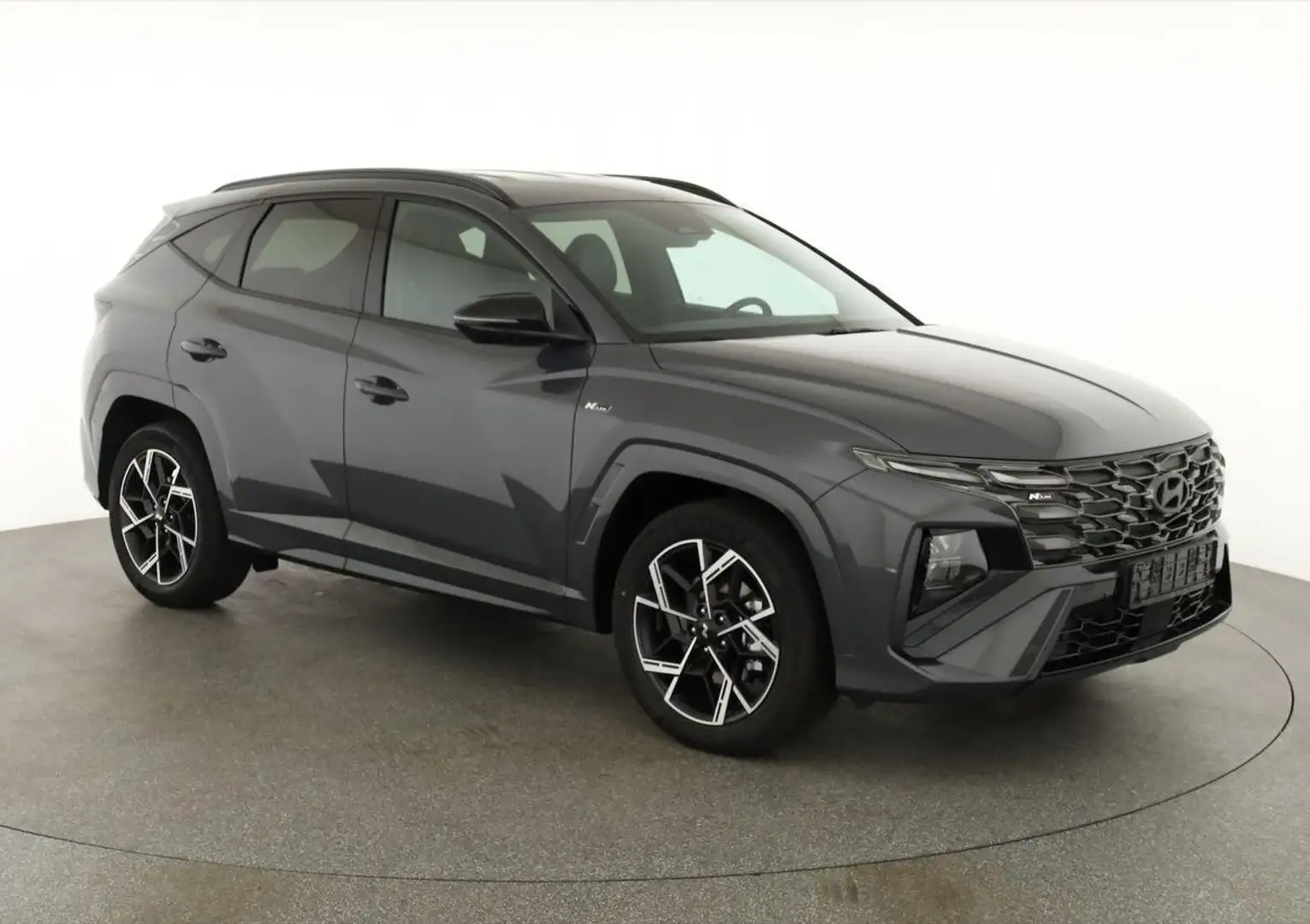 Hyundai TUCSON 1.6 T-GDI DCT 4WD N-LINE, el. Klappe, Teilleder... Grau - 1