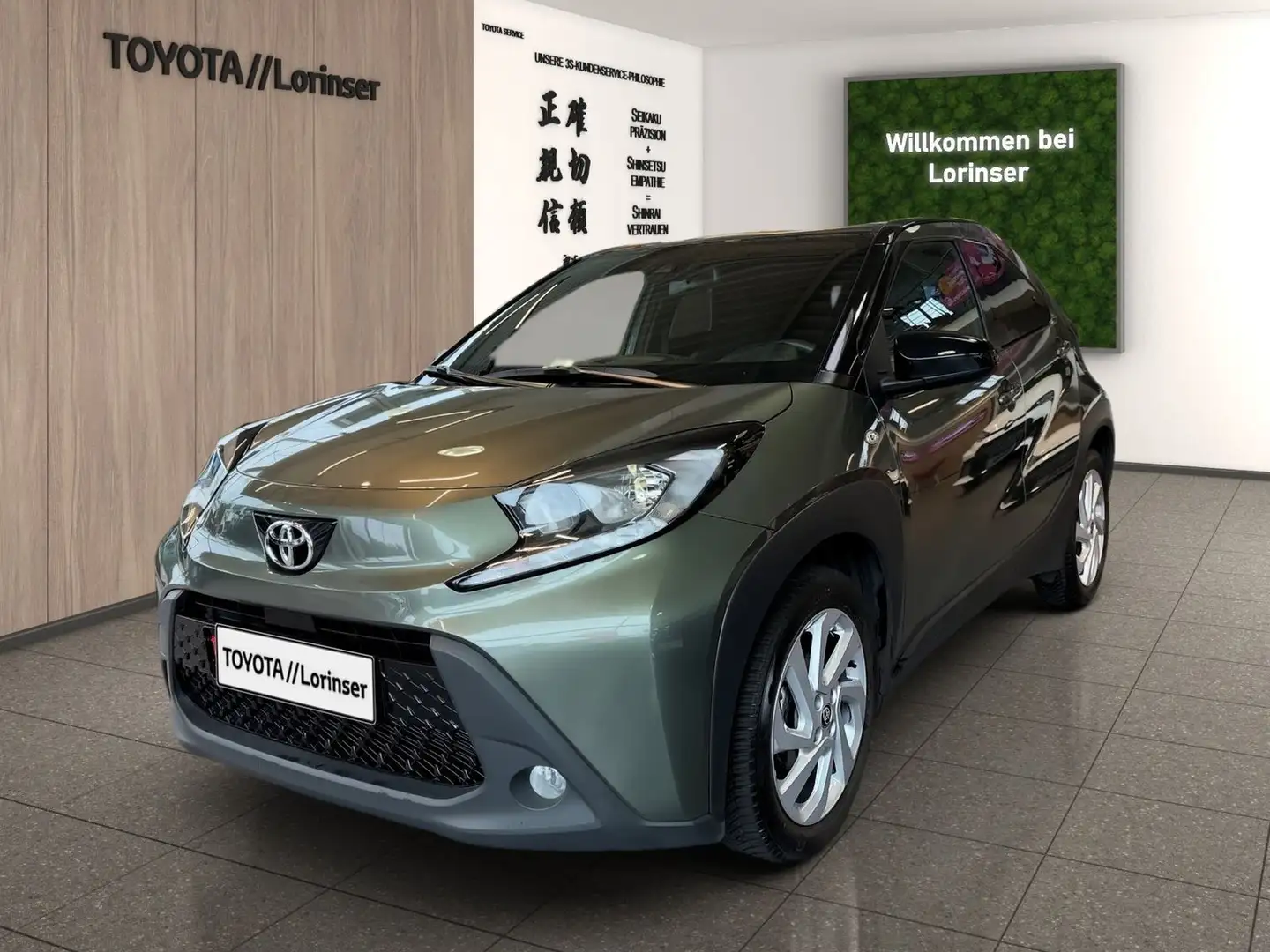 Toyota Aygo 1.0 Pulse Kam.+PDC+SHZ+ACC+Fernlichtass.+LM Grün - 1
