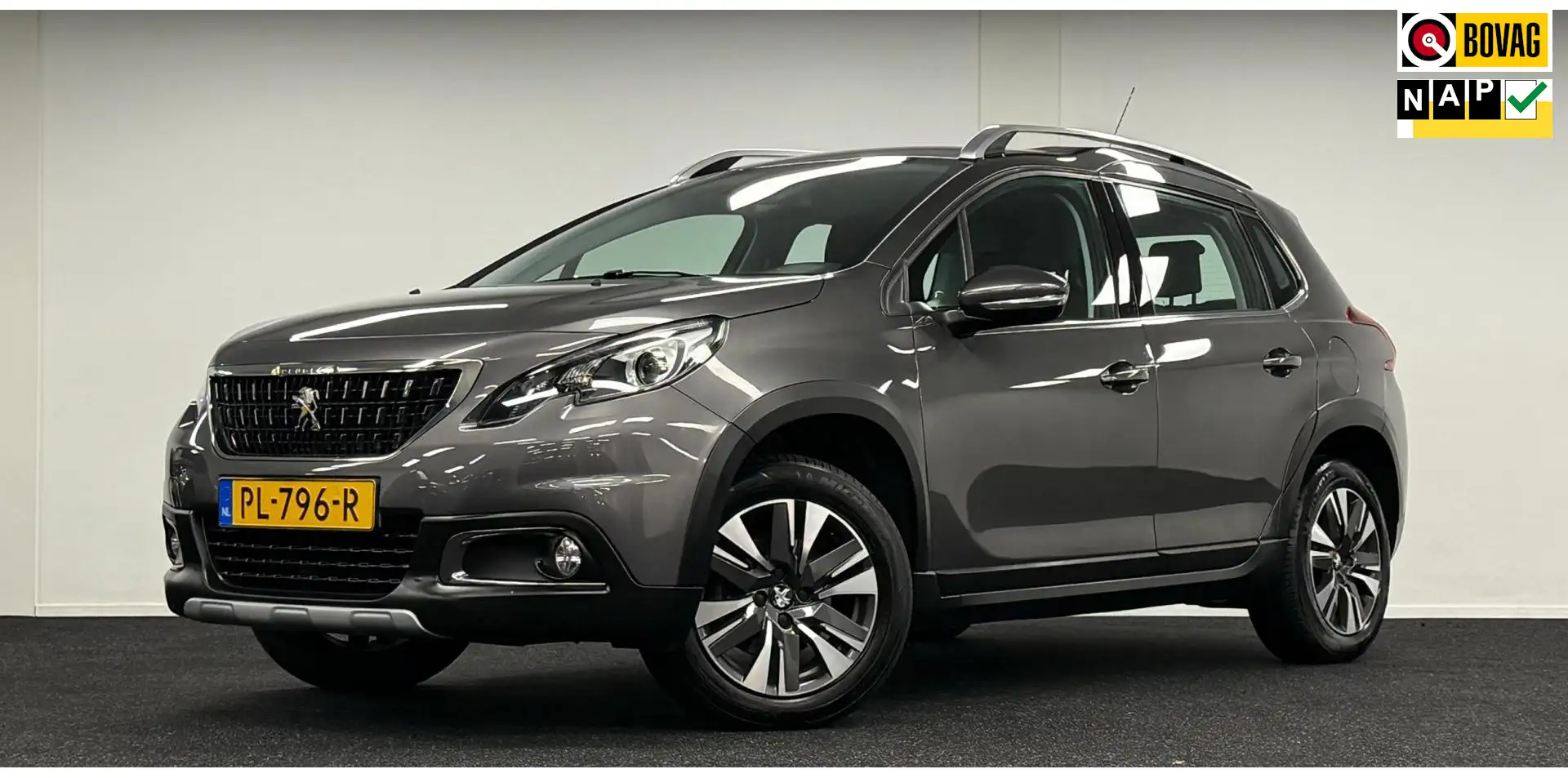 Peugeot 2008 1.2 PureTech Allure*Automaat*Trekhaak*Carplay*Navi Gris - 1