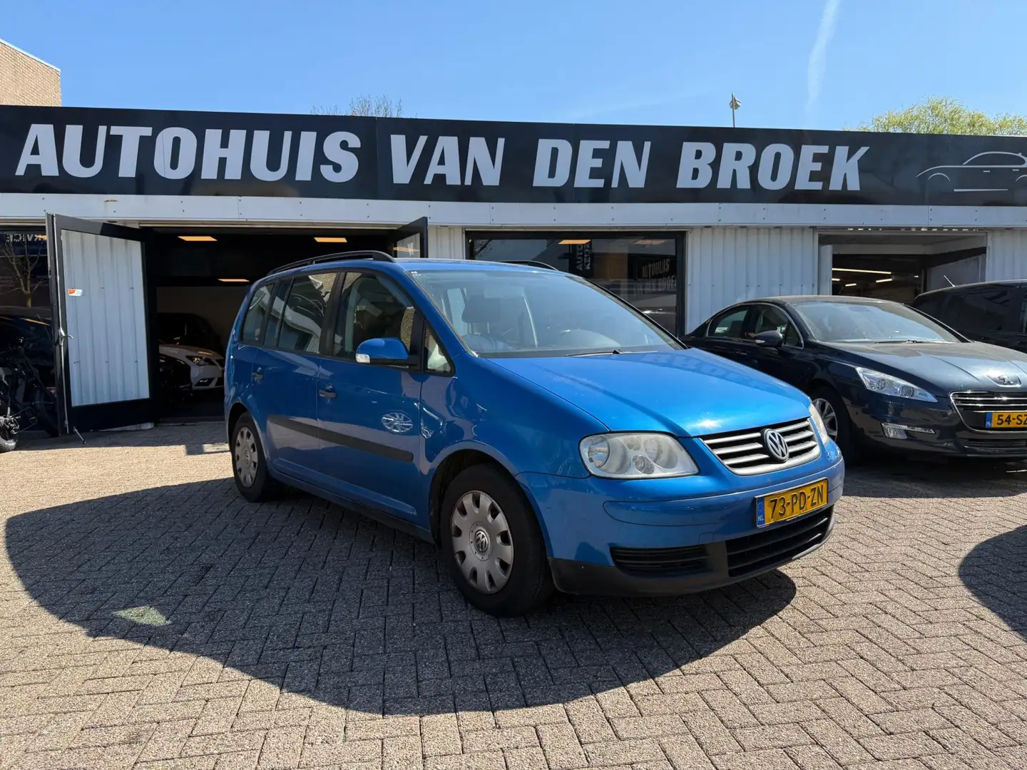Volkswagen Touran 1.6-16V FSI 7Persoons Airco Cruise Ctr Dakrails Tr Blauw - 1