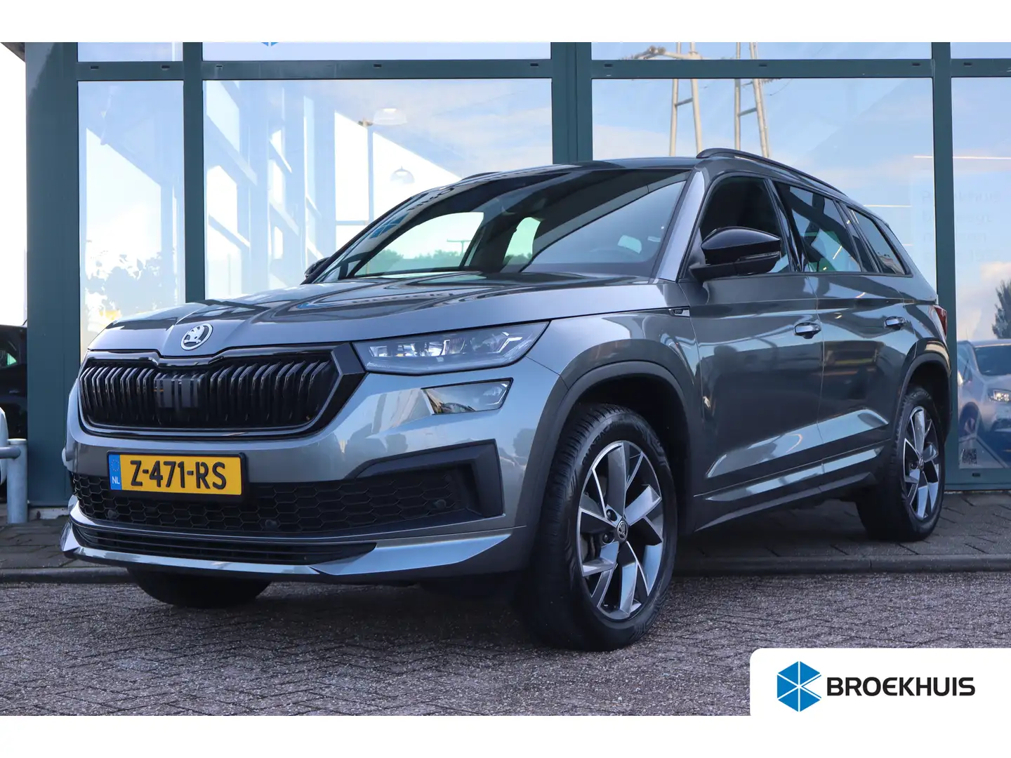 Skoda Kodiaq 150PK 1.5 TSI Sportline Business 7p. | Achteruitri Grijs - 1
