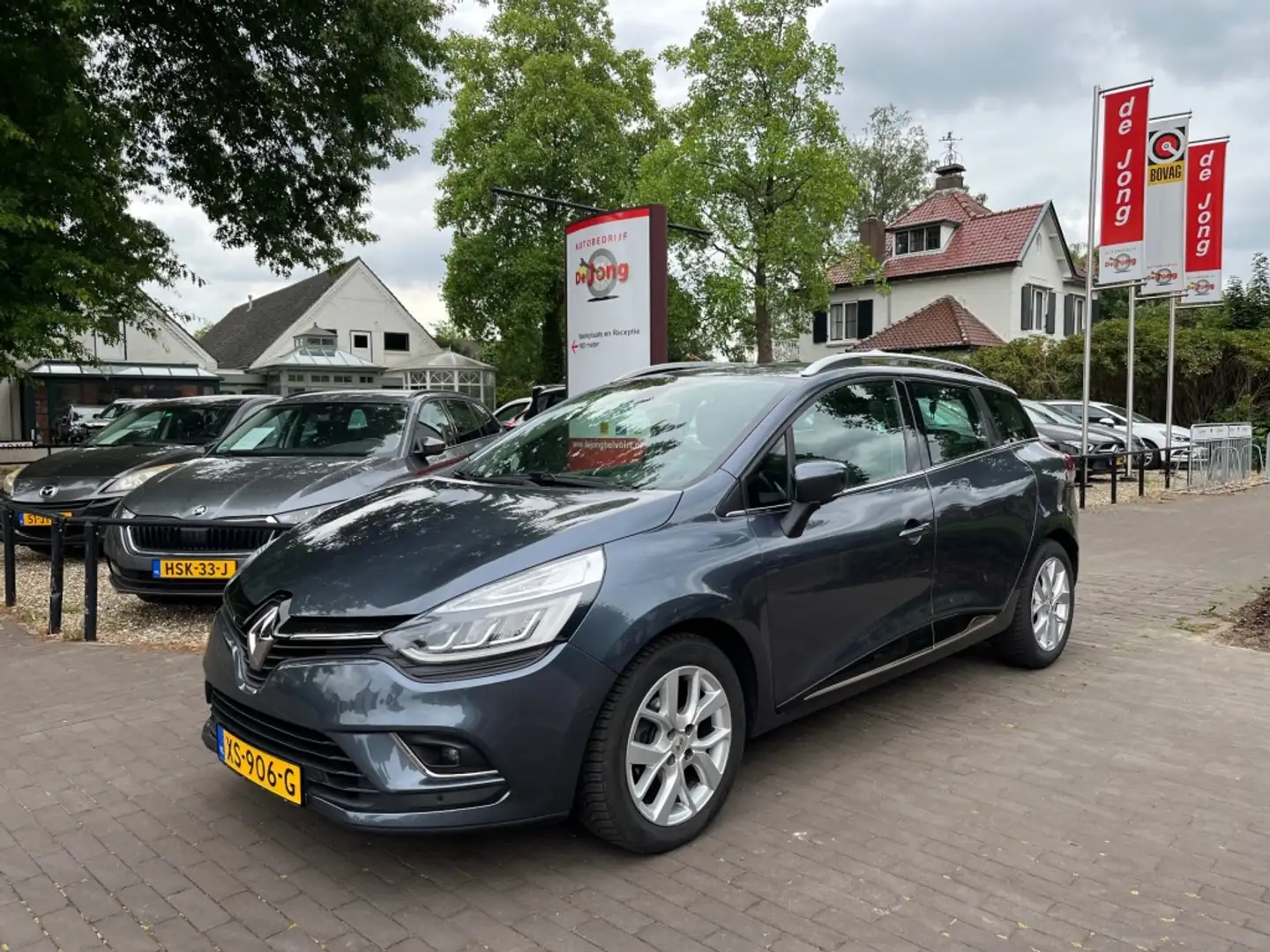 Renault Clio ESTATE 0.9 TCE INTENS / NAVI / CAMERA / TREKHAAK / Grijs - 1