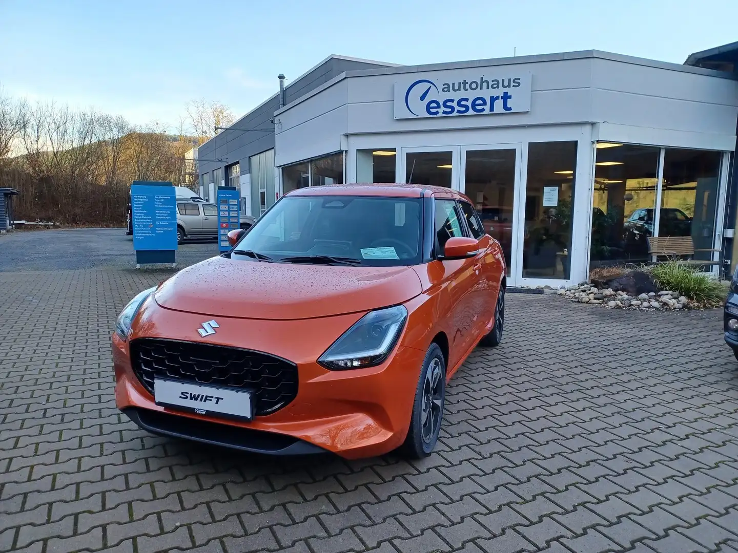 Suzuki Swift 1.2 Dualjet Hybrid Comfort+  Mit 5 J Gar. ab EZ Orange - 1