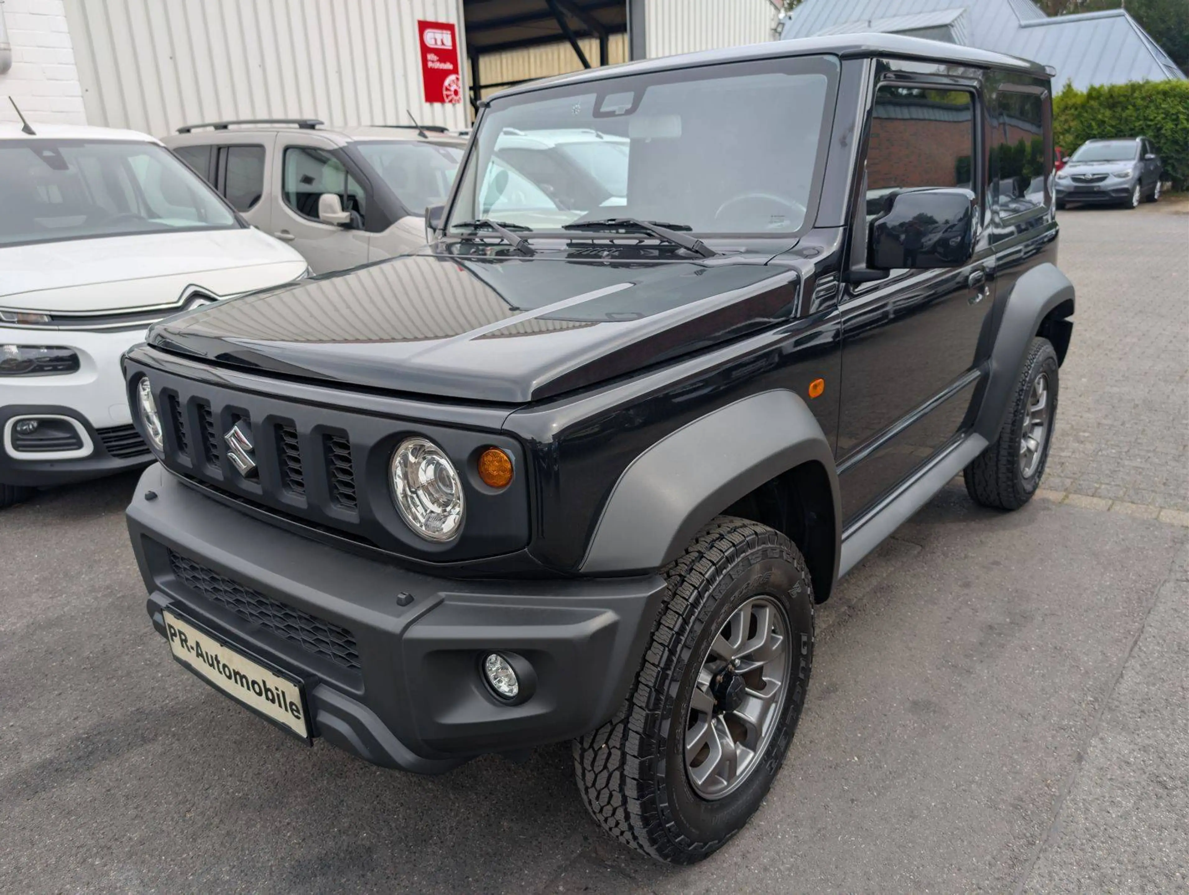 Suzuki Jimny Comfort+ AllGrip Navi+Cam/Klimaaut./Alu