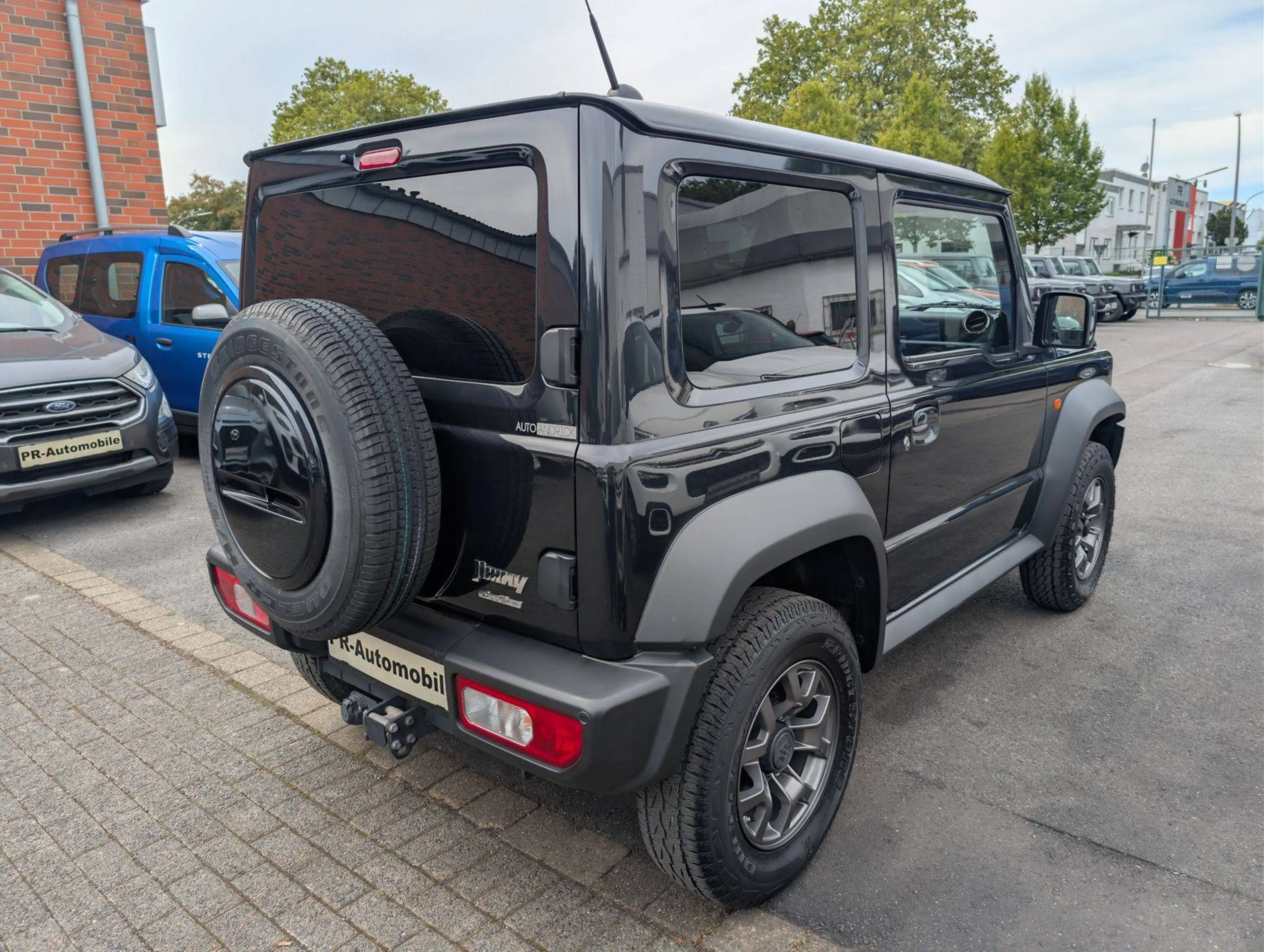 Suzuki Jimny Comfort+ AllGrip Navi+Cam/Klimaaut./Alu — photo 4