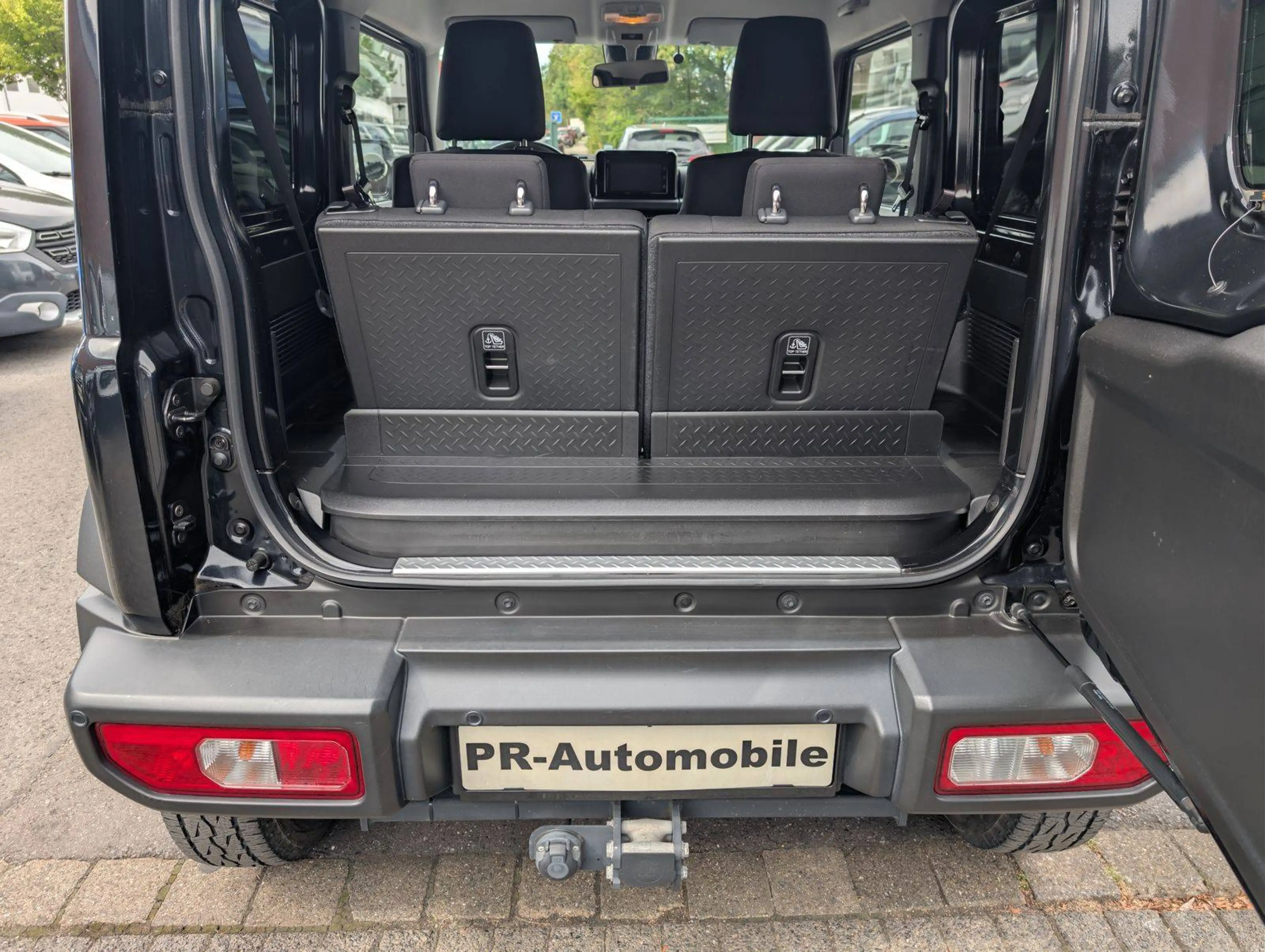Suzuki Jimny Comfort+ AllGrip Navi+Cam/Klimaaut./Alu — photo 10