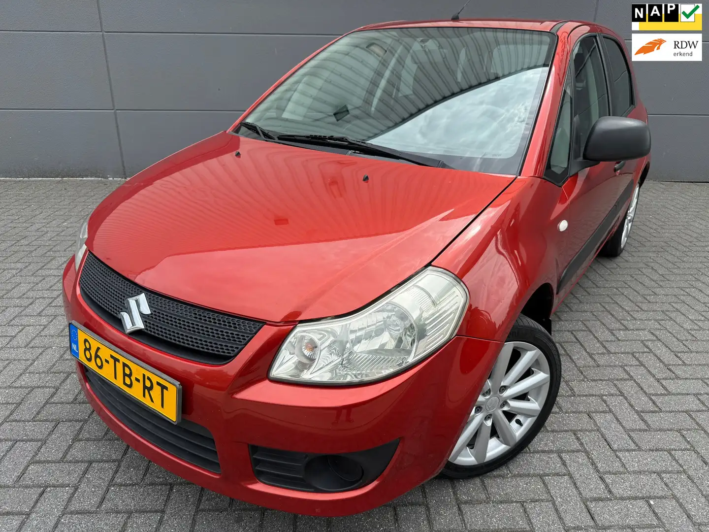 Suzuki SX4 1.5 Base*AIRCO*NAP*APK 04-07-2026*ISOFIX*VELGEN Naranja - 1