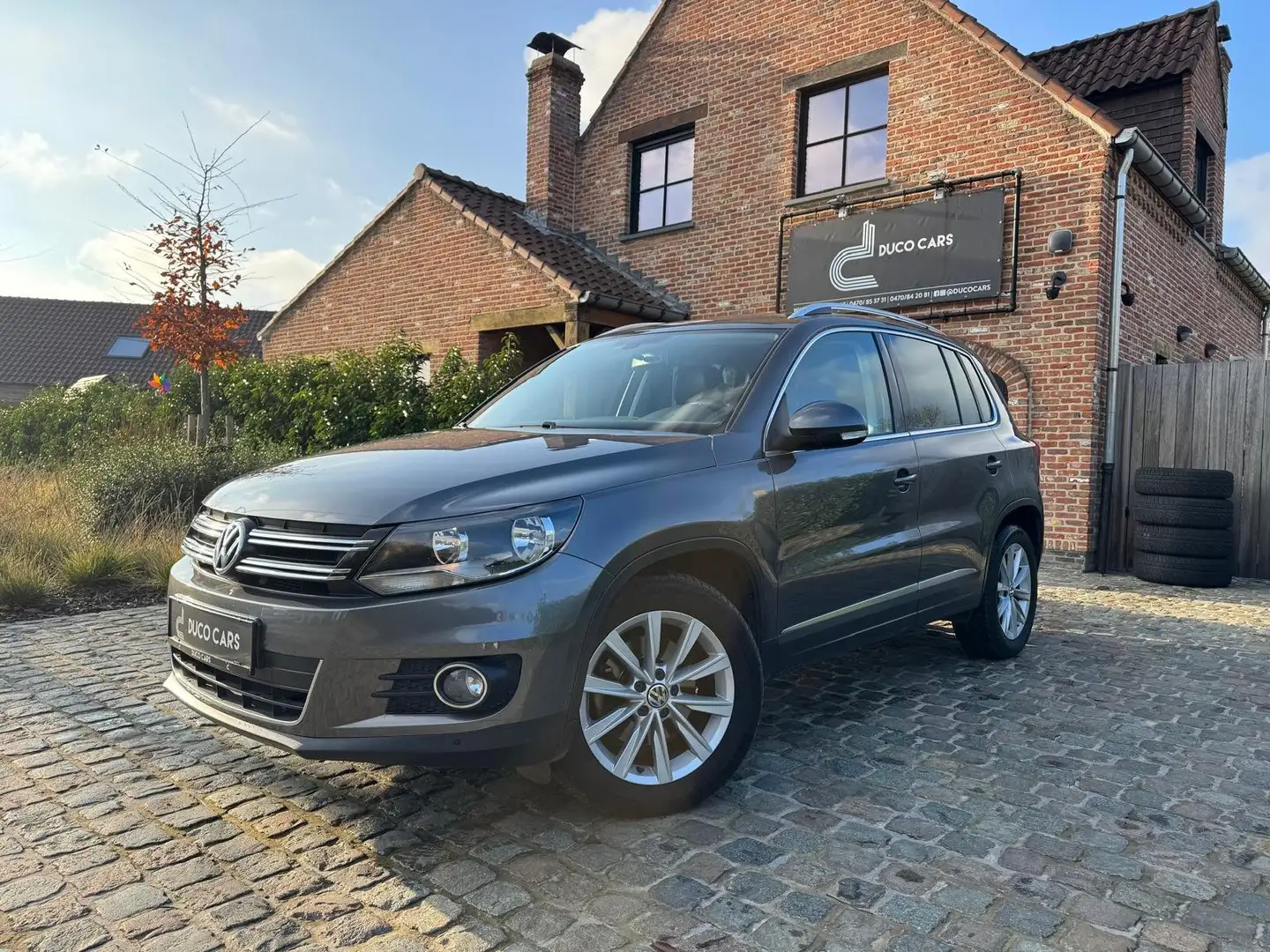 Volkswagen Tiguan Tiguan 1.4 TSI DSG BlueMotion Technology Sport Grijs - 1