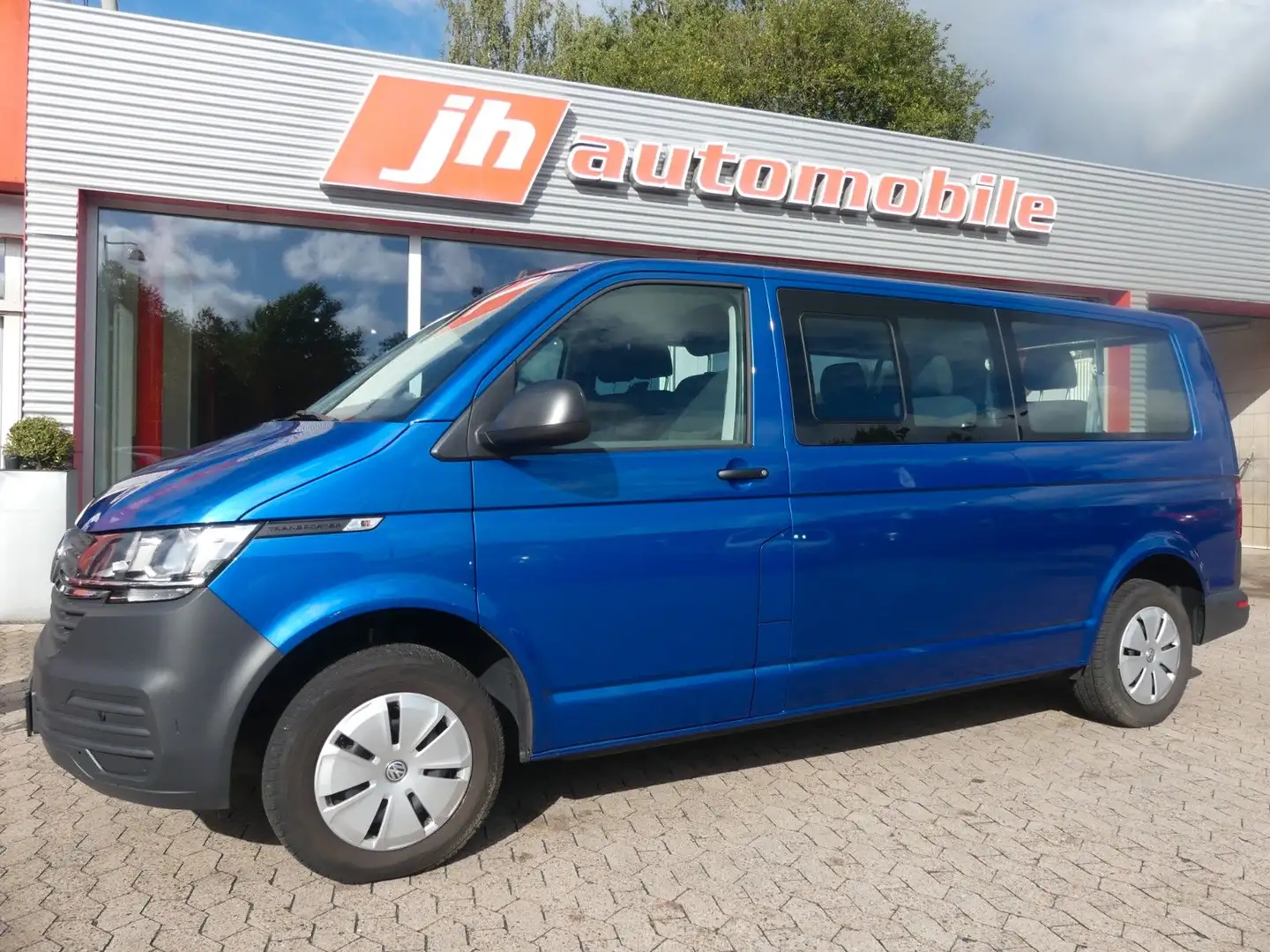 Volkswagen T6 Kombi T6.1 Kombi lang*Tempomat*SHZ*9-Sitzer*Klima Blau - 1