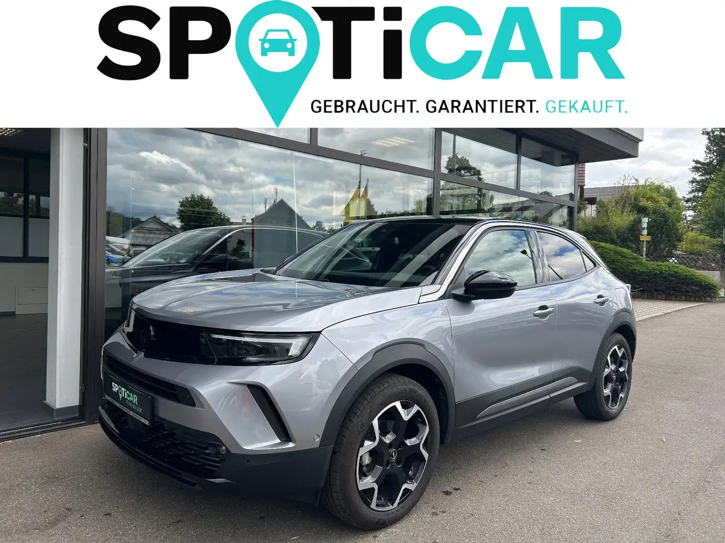 Opel Mokka Ultimate 1.2T AHK+NAVI+RFK+KLIMAAUT+SHZ+BT Grijs - 1