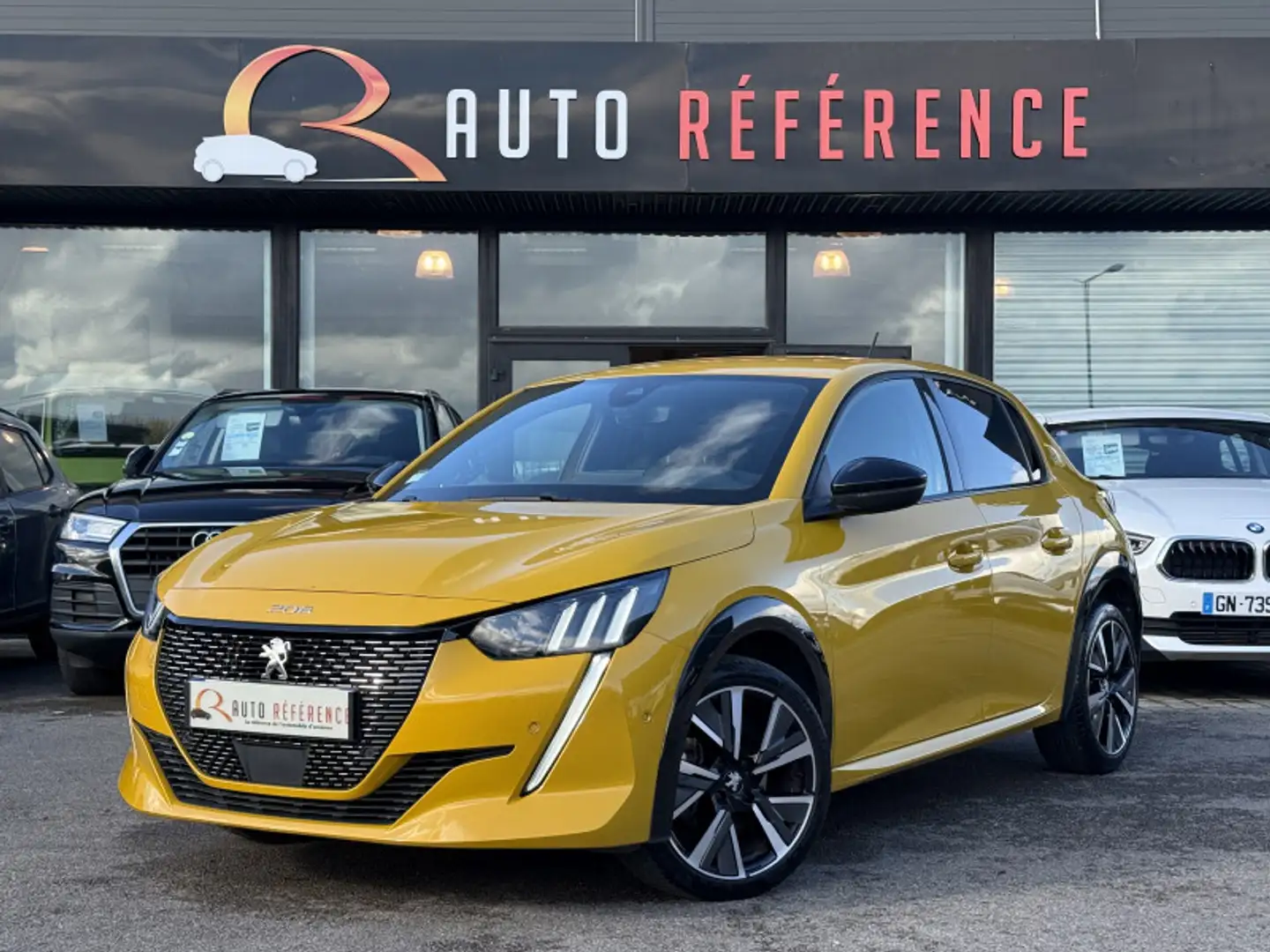 Peugeot 208 1.2 100 CH GT / CAMERA / CARPLAY / 3D COCKPIT Gelb - 1