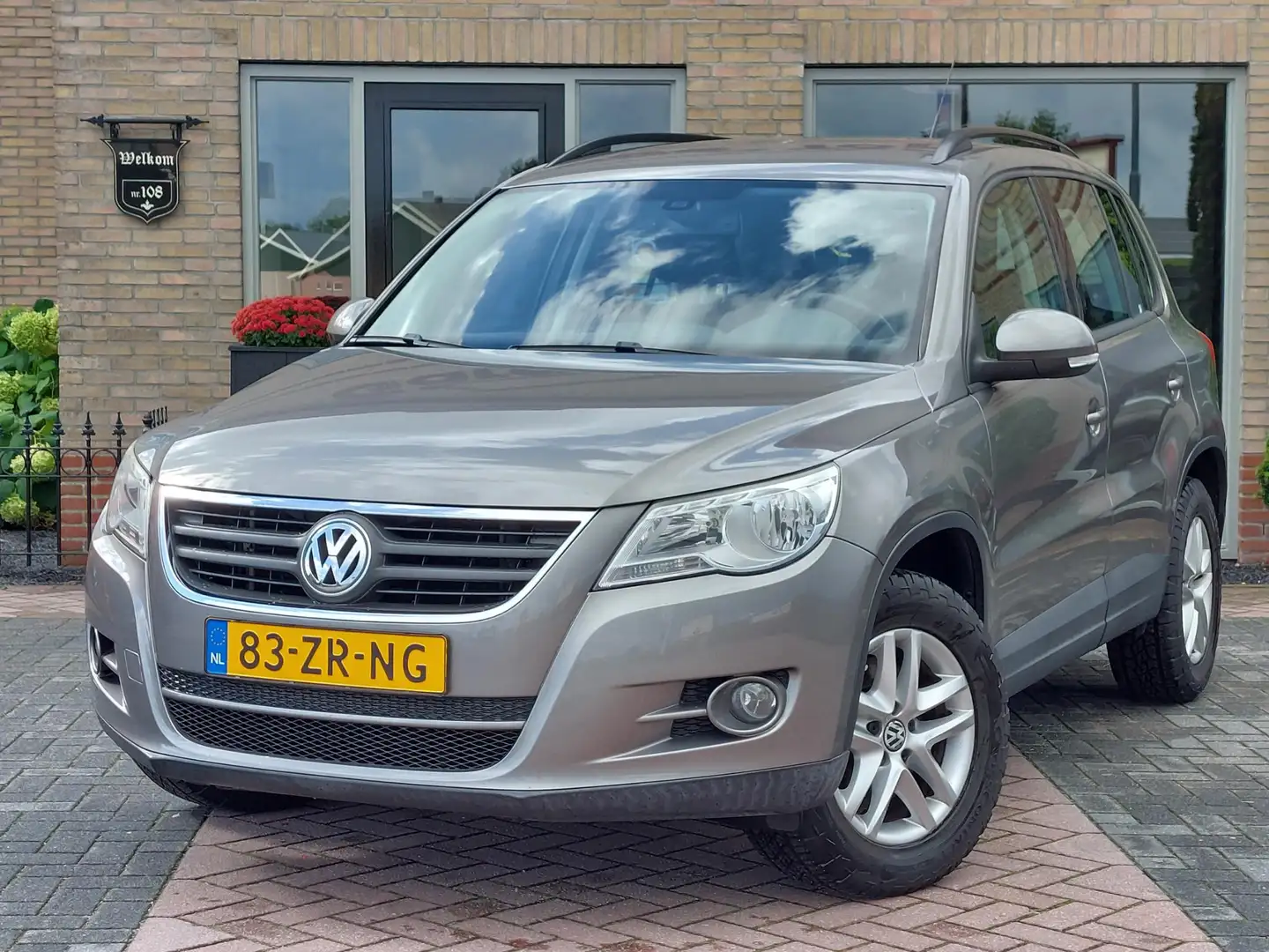 Volkswagen Tiguan 1.4 TSI Comfort&Design 4Motion | Trekhaak | 100% o Grijs - 1