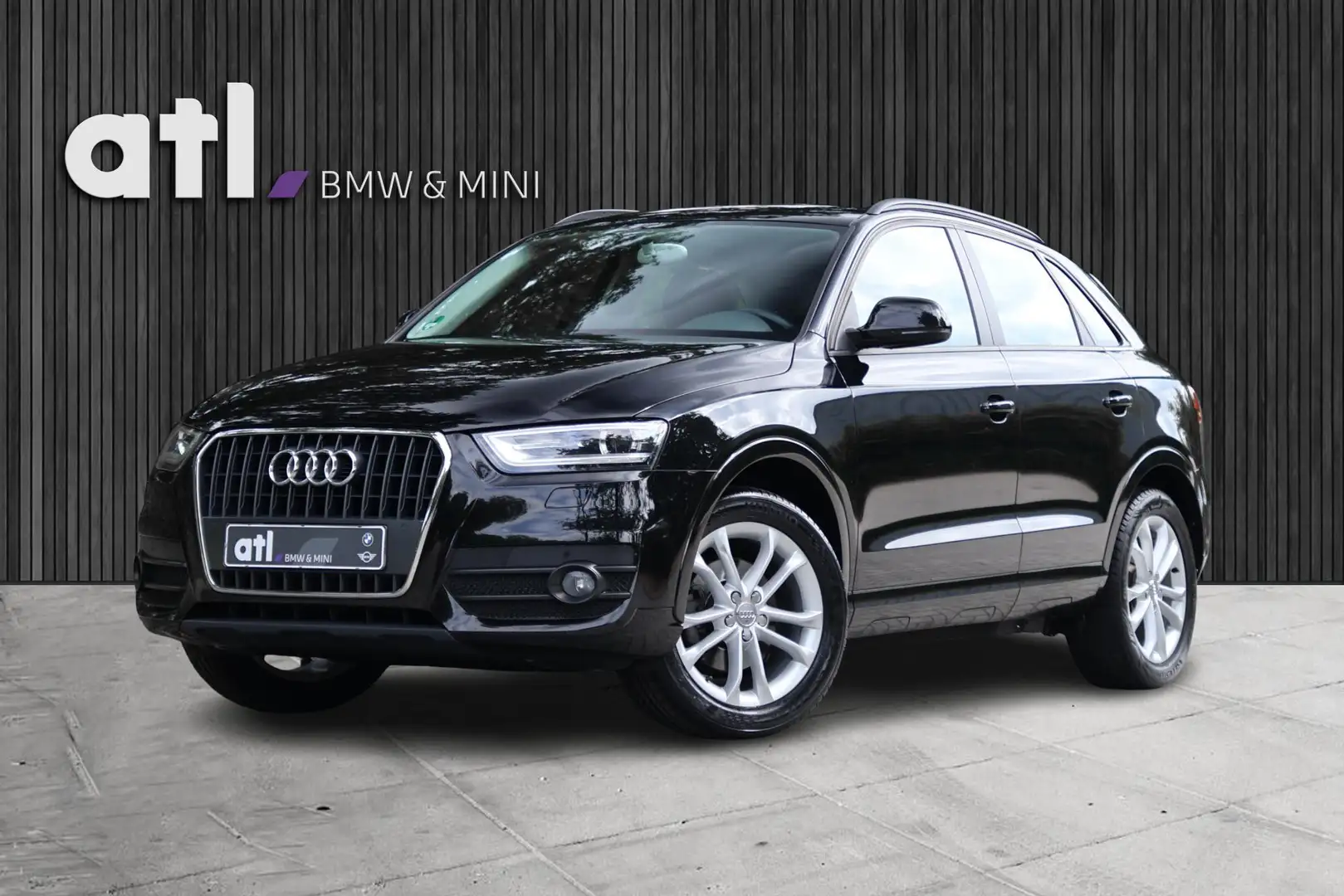 Audi Q3 1.4 TFSI Trekhaak, Navigatie, Achteruitrijcamera, Zwart - 1