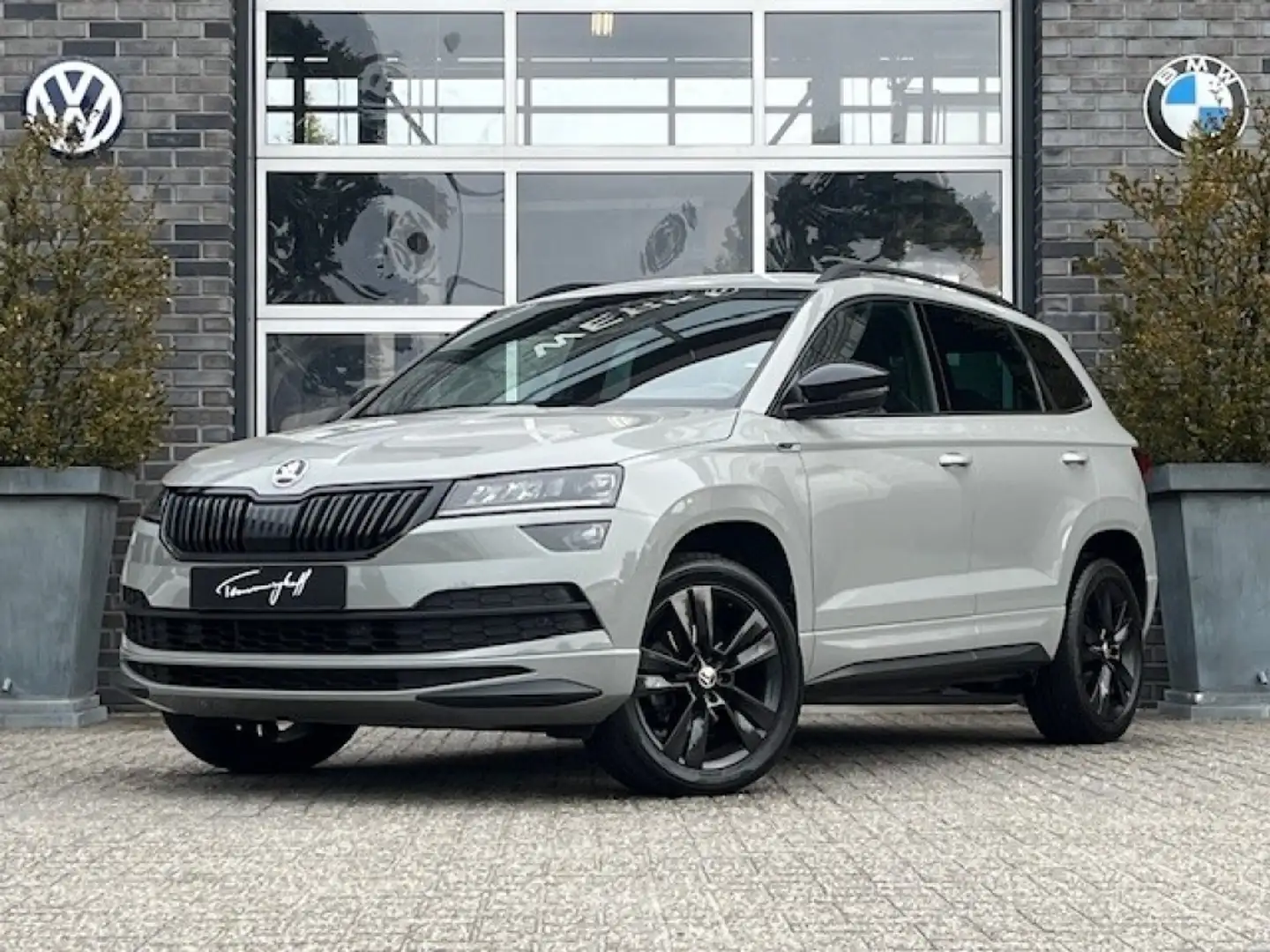 Skoda Karoq 1.5 TSI DSG AUT. SPORTLINE - VIRTU -  CANTON - 18 Grau - 1