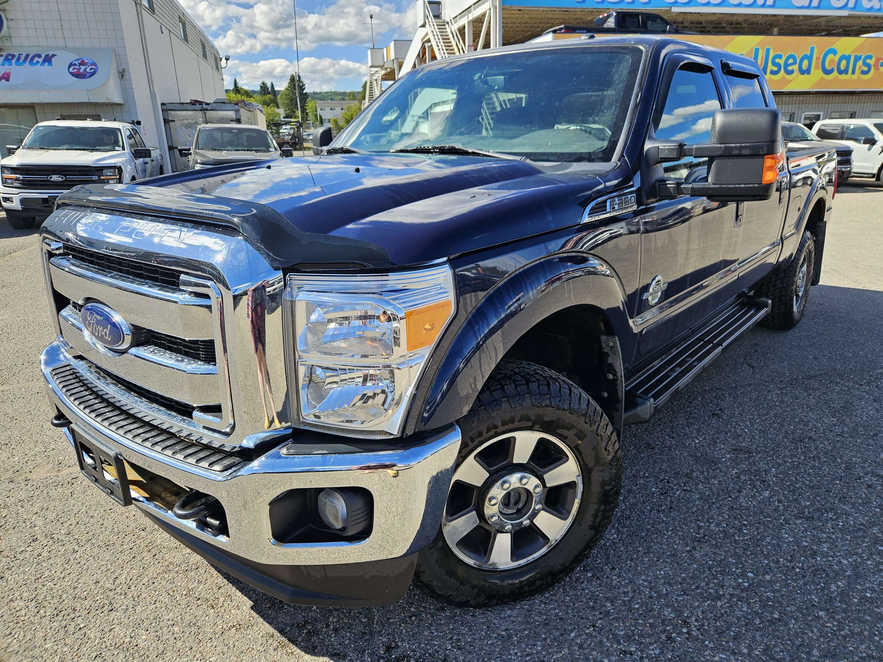 Blue 2013 Ford F-350 Super Duty Pickup Truck Four-Wheel Drive 6-Speed Automatic