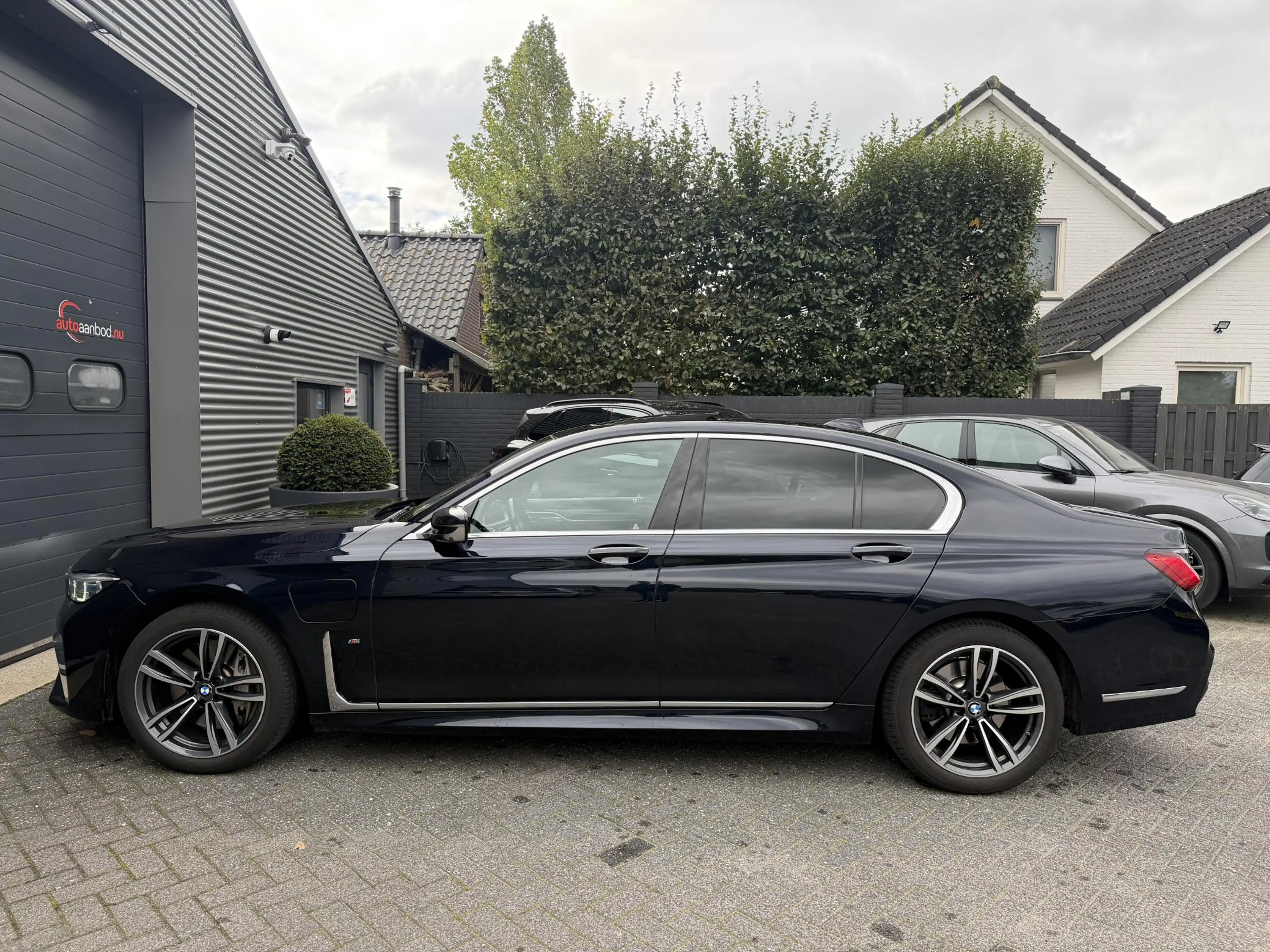 BMW 745 7-serie 745e High Executive M-Sport | Panoramadak — photo 7