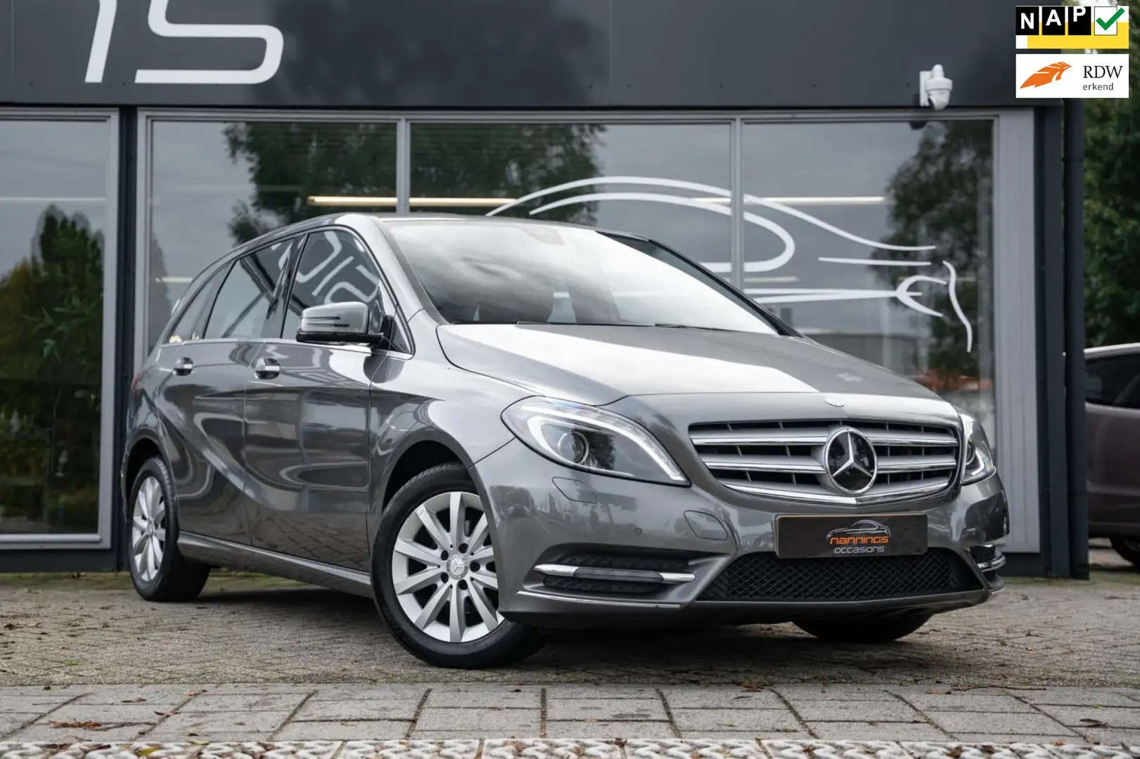 Mercedes-Benz B 180 Ambition|Trekhaak|BI-Xenon|PDC|Navi|Cruise Control Grigio - 1