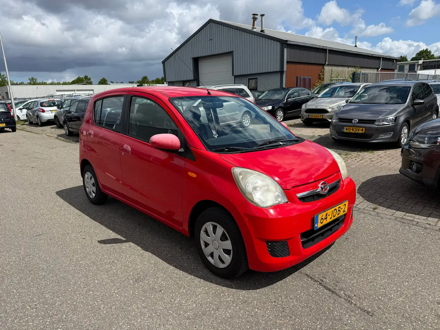 Daihatsu Cuore 1.0 Premium Airco Bj:2009 NAP! Red - 2