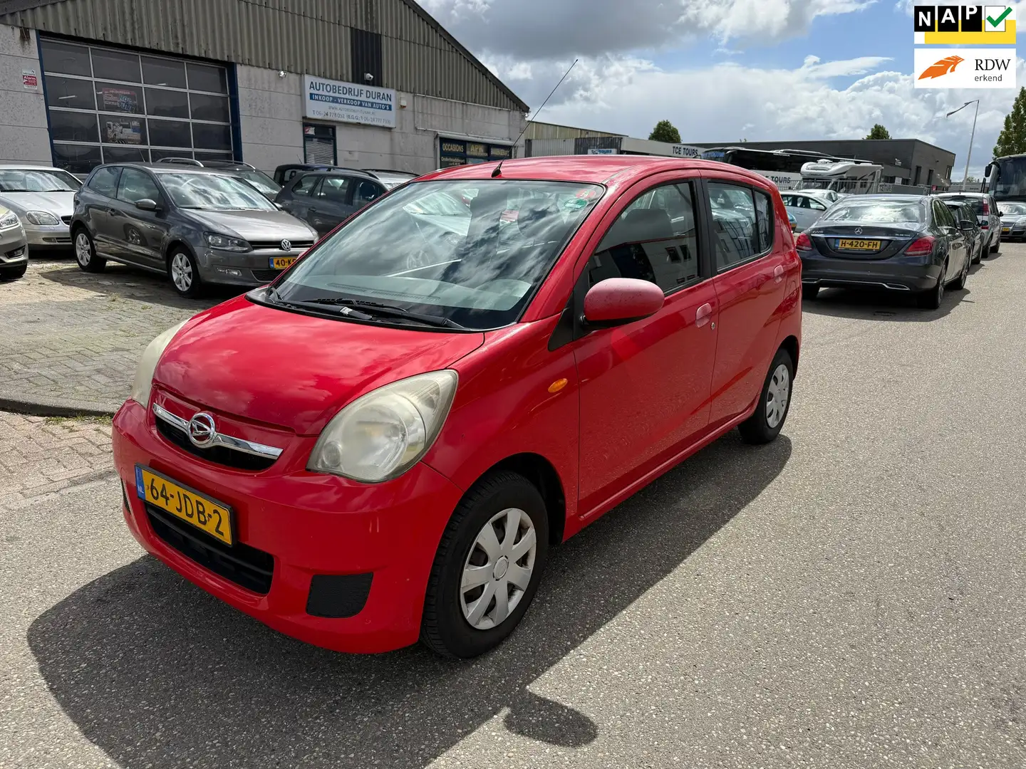 Daihatsu Cuore 1.0 Premium Airco Bj:2009 NAP! Red - 1