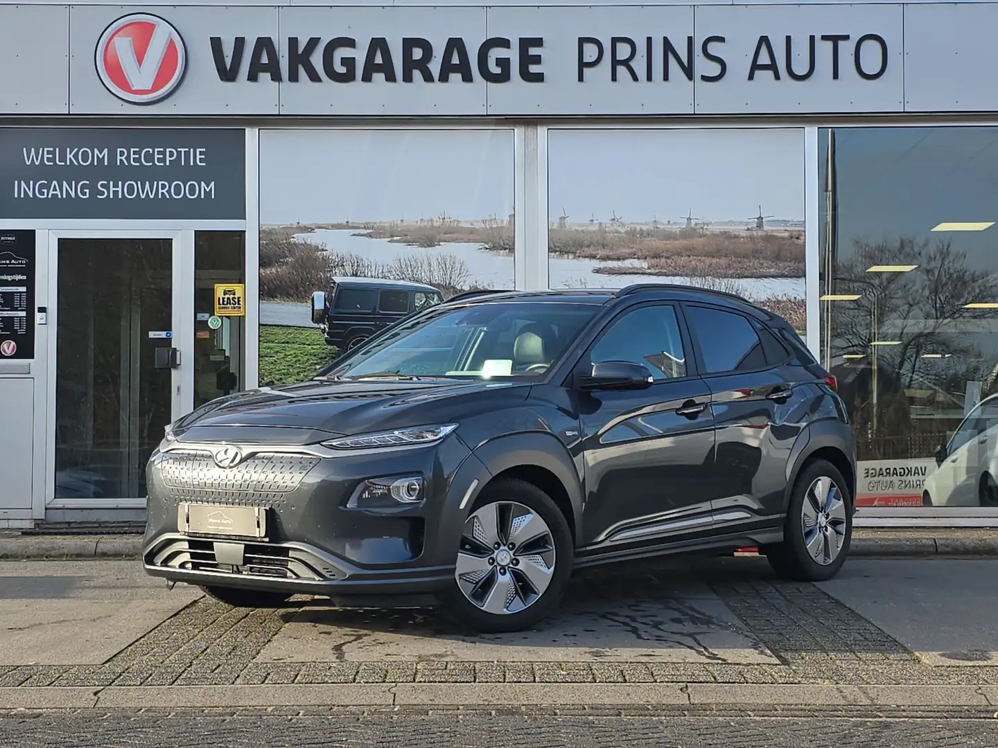 Hyundai KONA EV Premium 64 kWh |SOH 87%|STOELVERW+VERKOEL.|NAVI Grey - 1