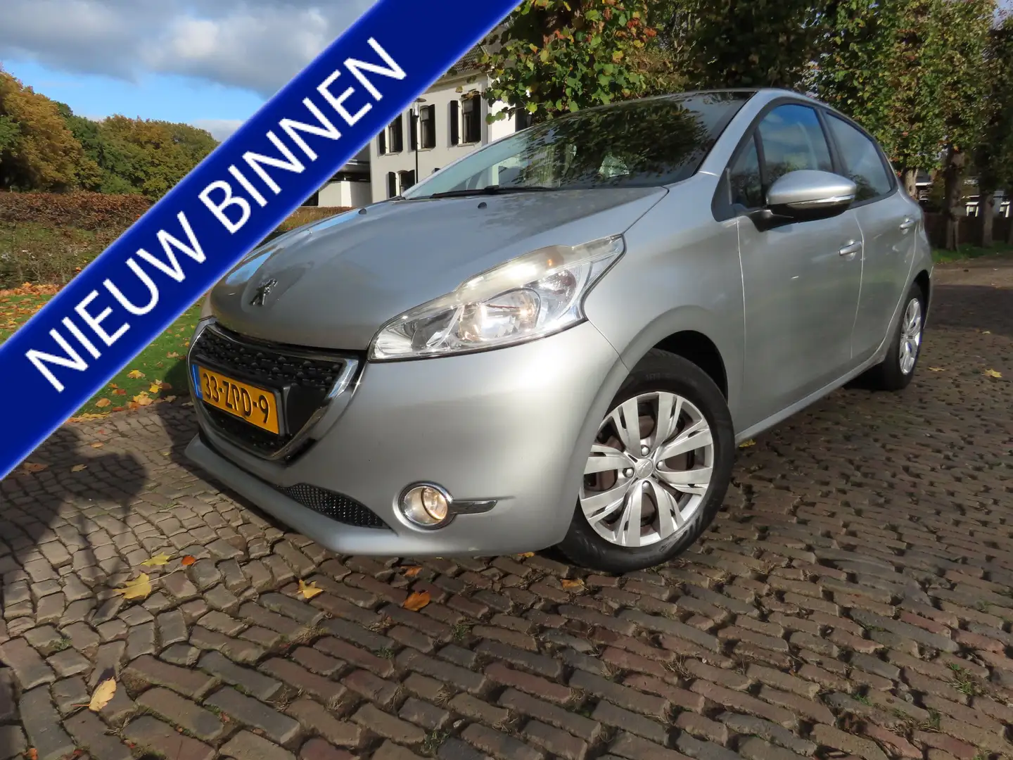 Peugeot 208 1.2 VTi Blue Lease Airco Cruisecontrol Navigatie 5 Grijs - 1