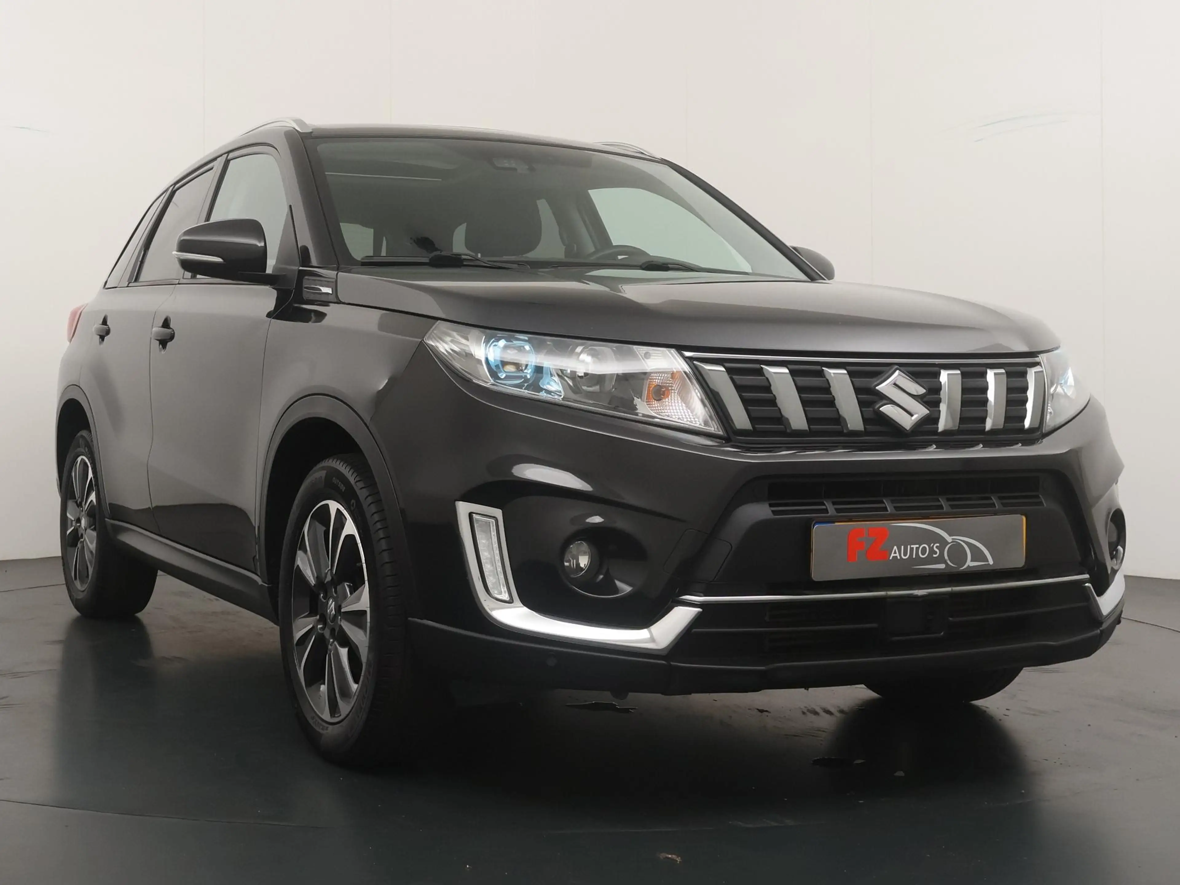 Suzuki Vitara 1.4 Boosterjet Stijl - Navigatie - Schuif/kantelda — photo 7