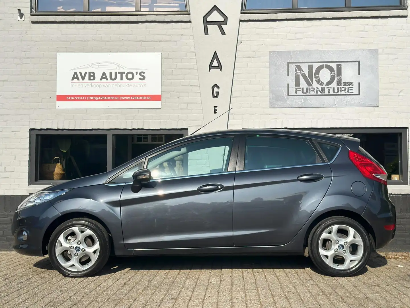 Ford Fiesta 1.25 Titanium Airco Aux PDC APK 13-2-2026 Grijs - 2
