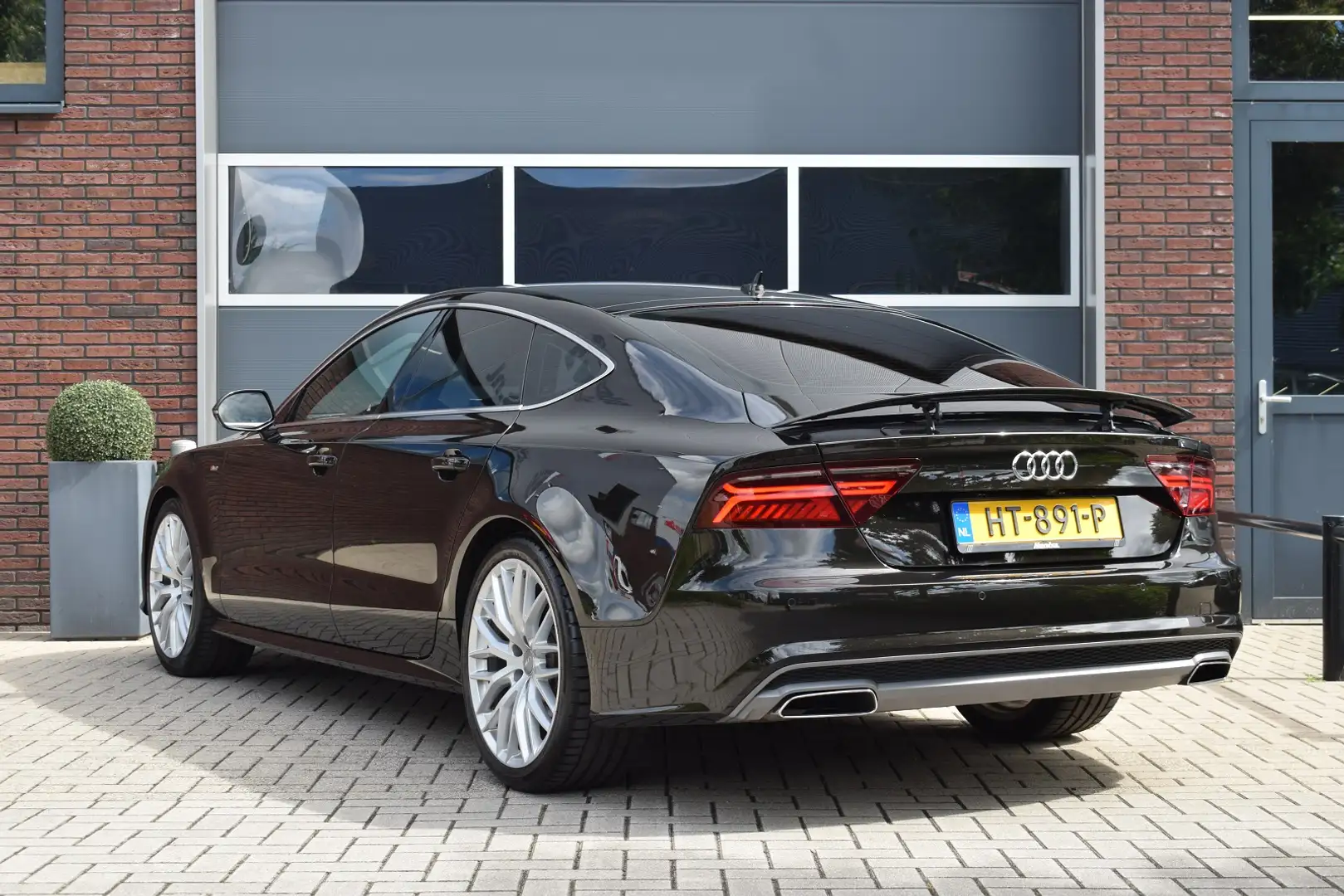 Audi A7 Sportback 1.8 TFSI 190pk S-line | Leer | Camera | Negro - 2