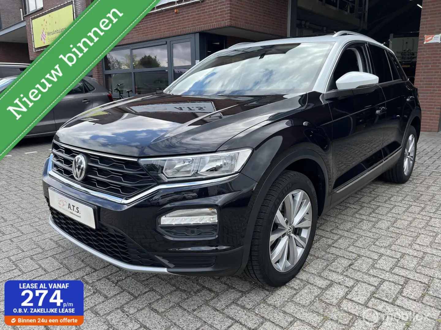 Volkswagen T-Roc 1.0 TSI Style NAVI*PANO-DAK*PDC*CARPLAY* Zwart - 1