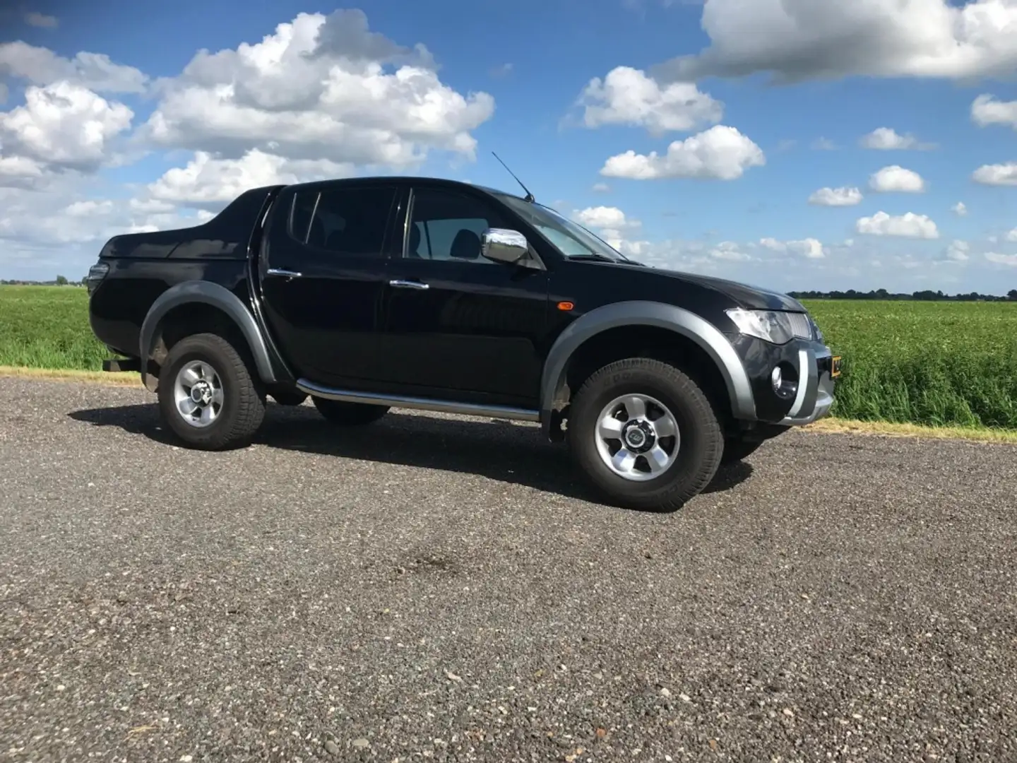 Mitsubishi L200 MITSUBISHI 2.5 131 KW DOUBLE CAB Zwart - 1