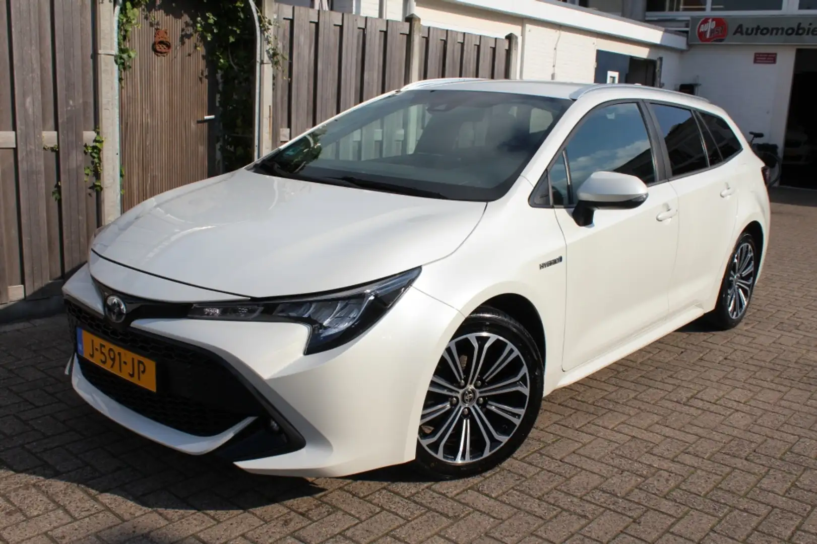 Toyota Corolla Touring Sports 1.8 Hybrid Business Plus Wit - 2