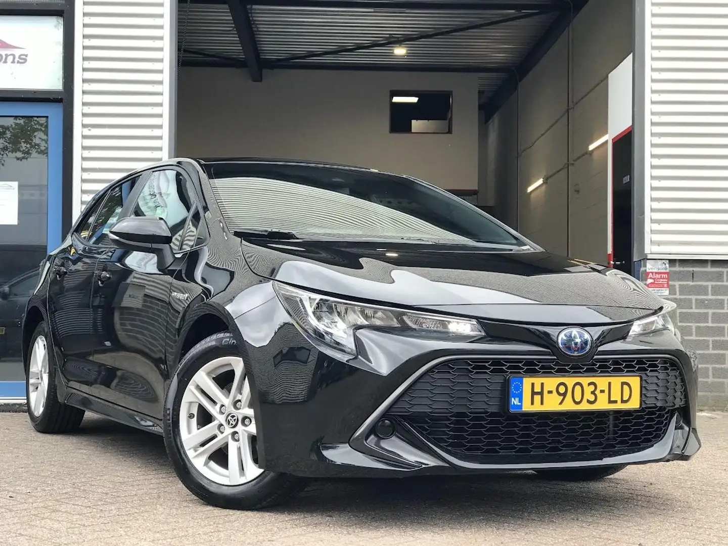 Toyota Corolla 1.8 Hybrid Active|Camera|Clima|Cruise|Automaat Zwart - 1