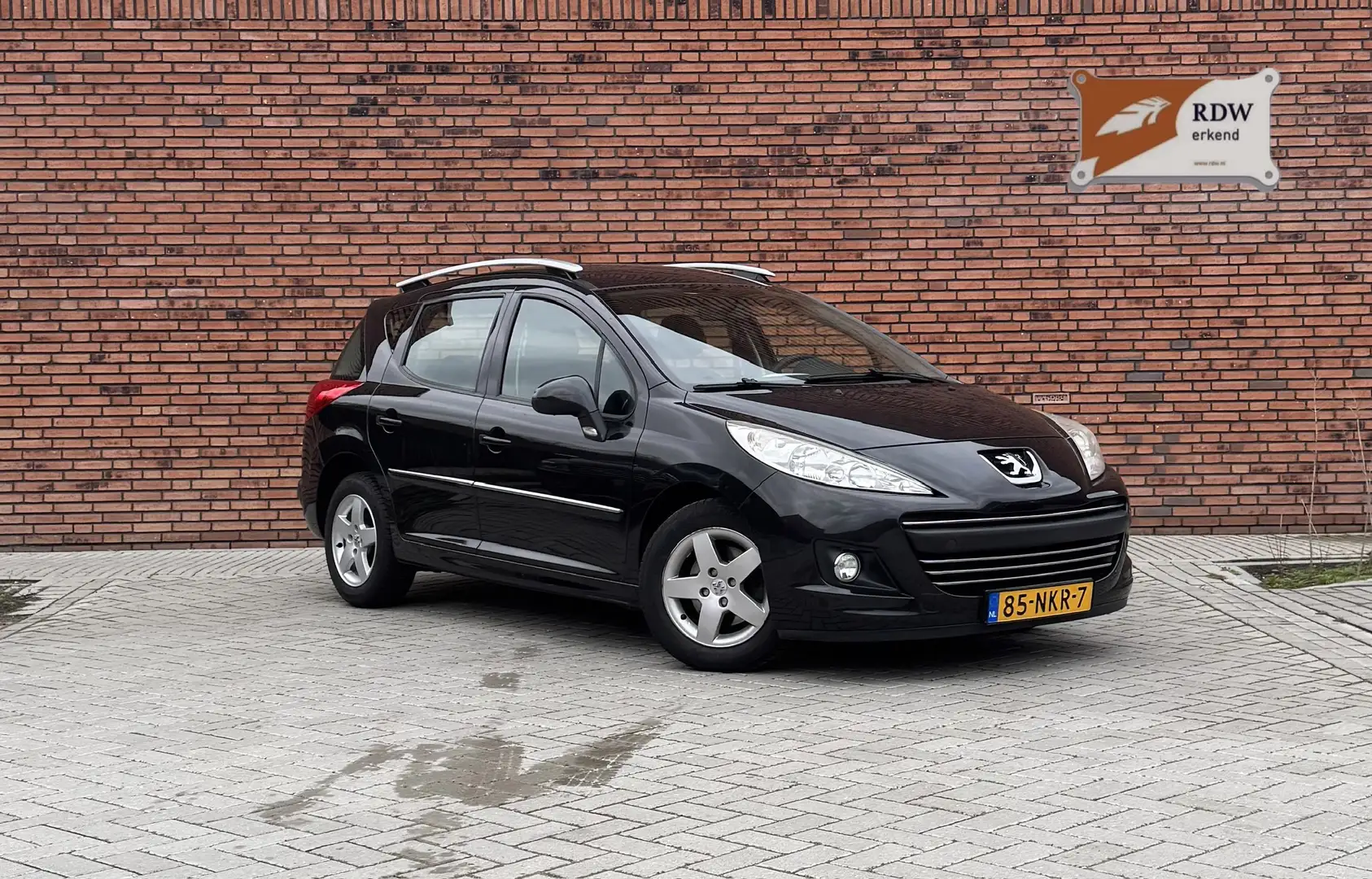 Peugeot 207 1.4 VTi Style, New Stuurpomp, Airco, Cruise Schwarz - 1