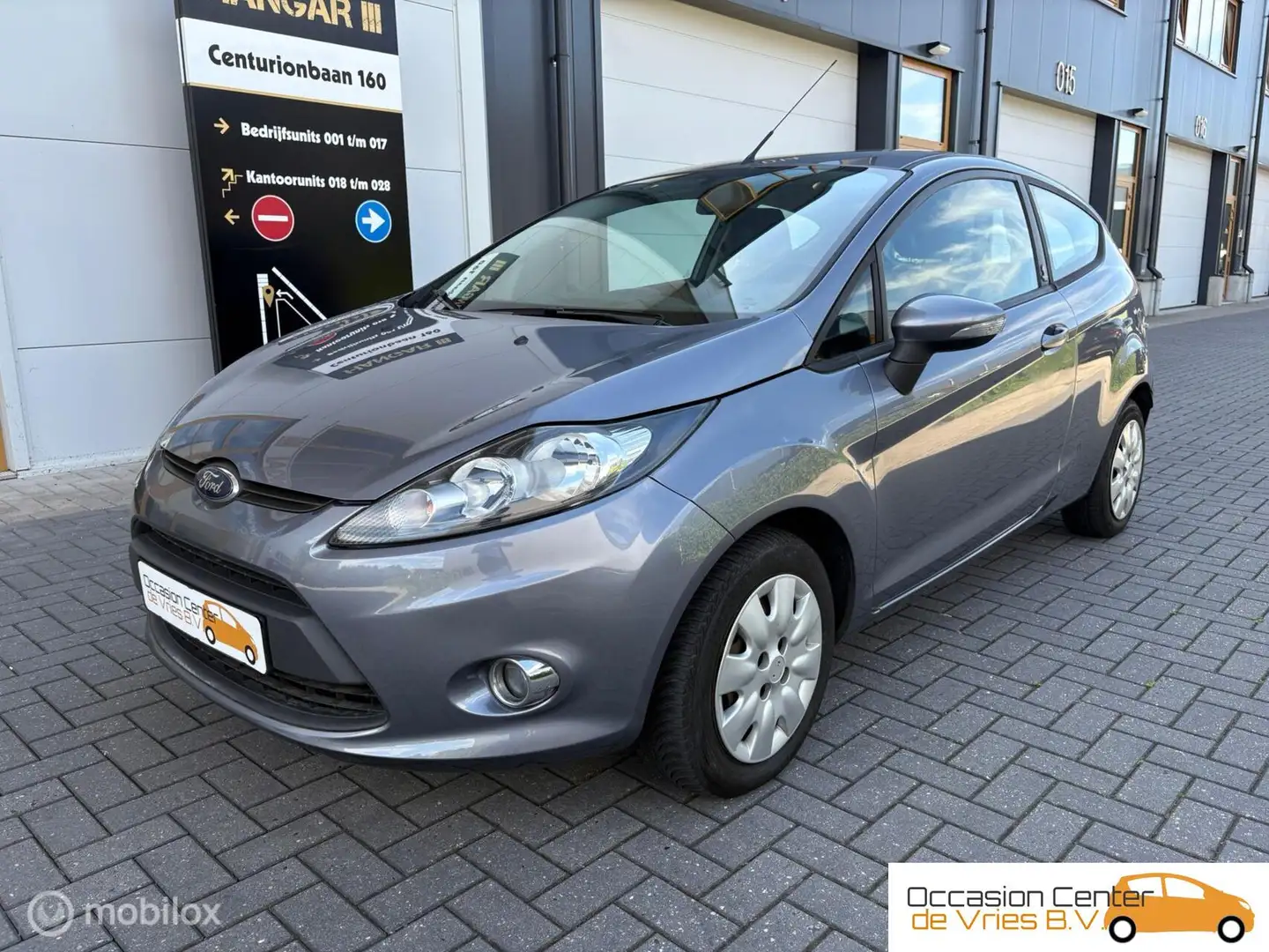 Ford Fiesta 1.25 Airco Elektr Pakket Stoelverwarmd Bluetooth Grijs - 2